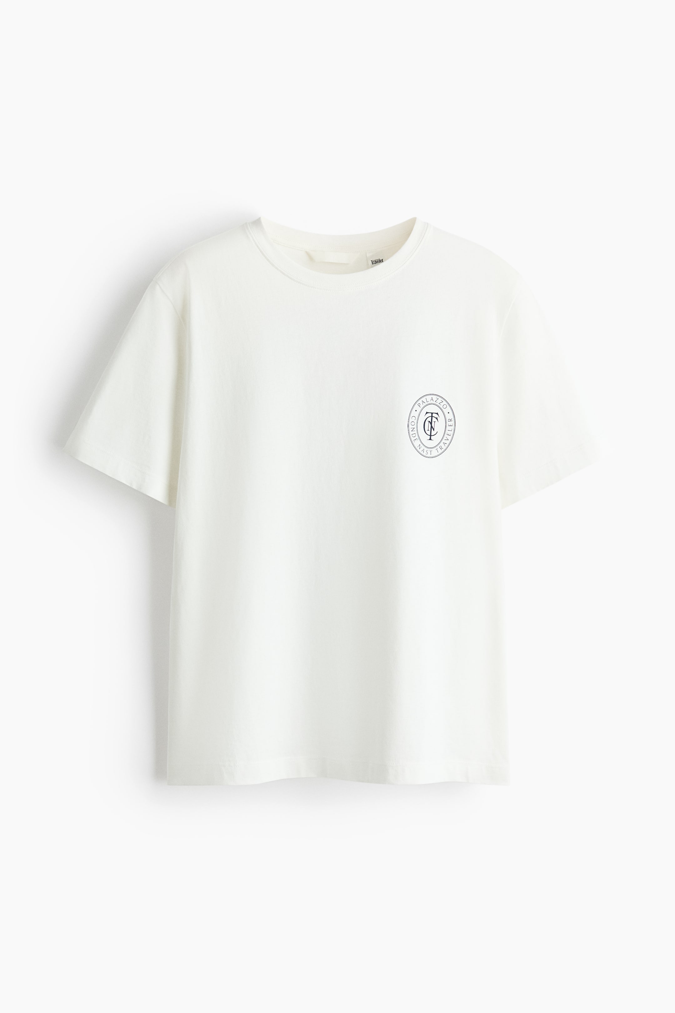 View larger image: This front-facing white short-sleeved t-shirt features a ribbed crew neck. A circular dark blue graphic is prominently displayed on the left chest area, and the t-shirt showcases a straight hem.
