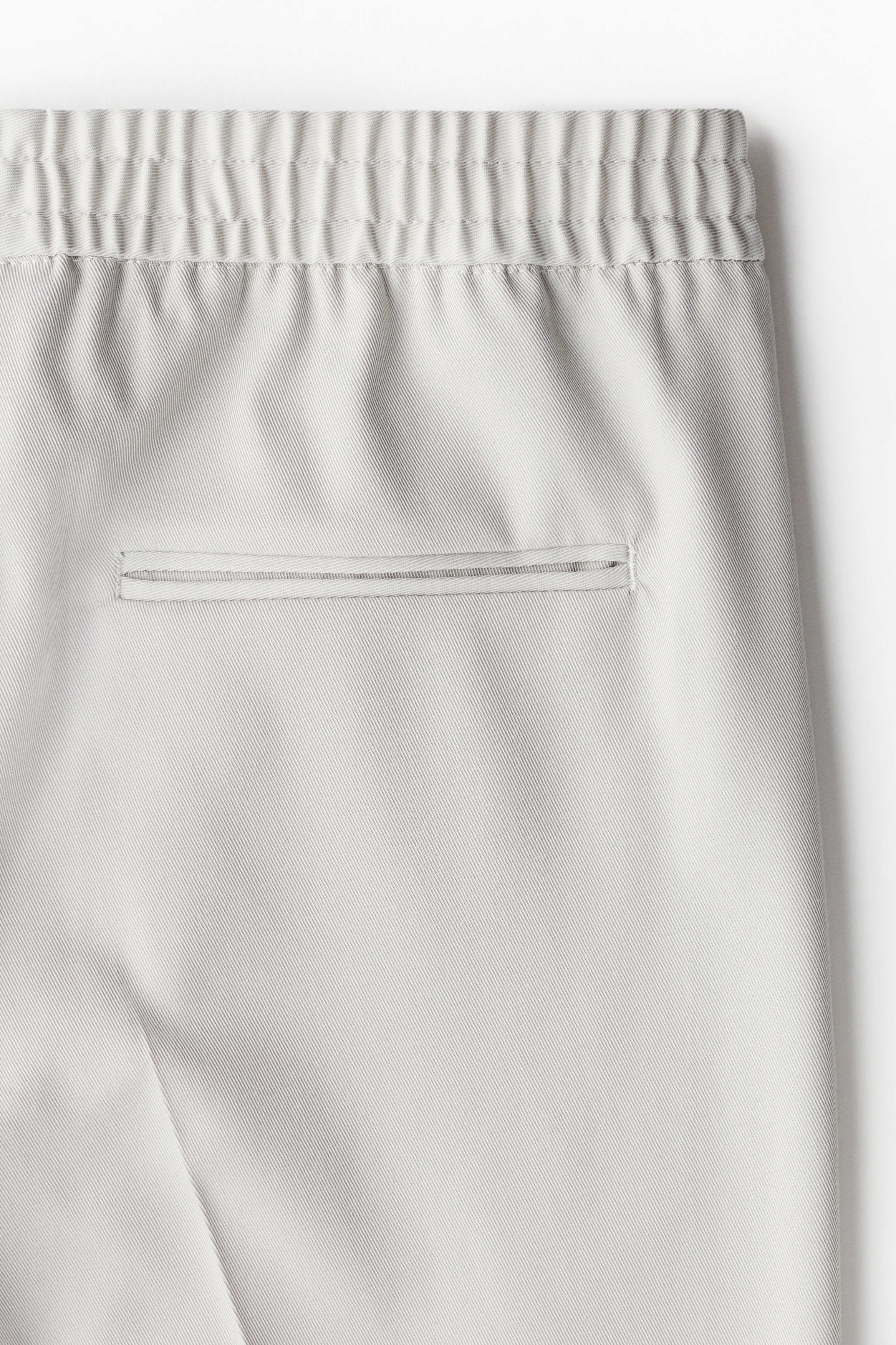 スリムフィット ツイルパンツ - ライトベージュ - Men | H&M JP