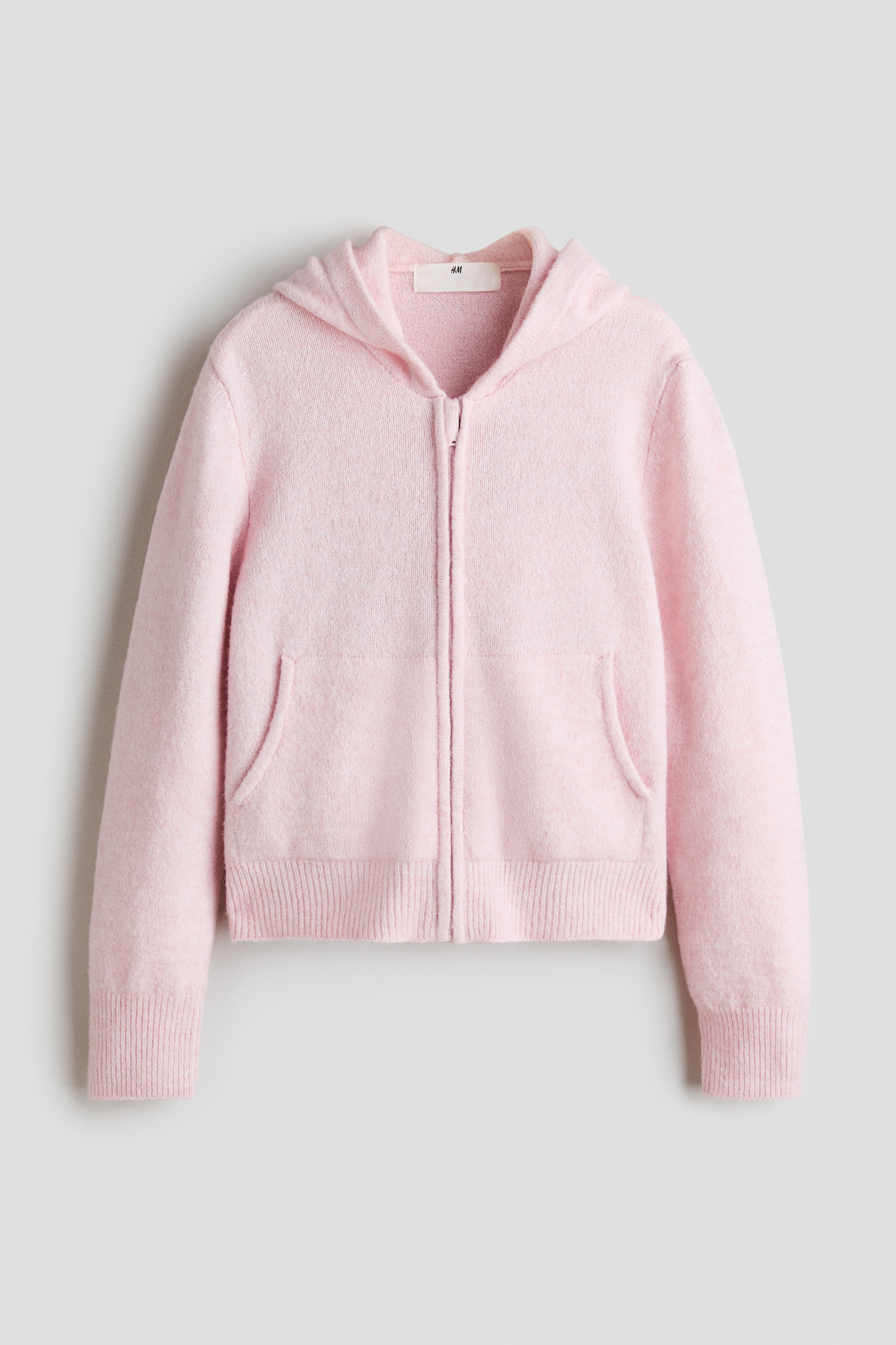 Knitted zip-through hoodieModel