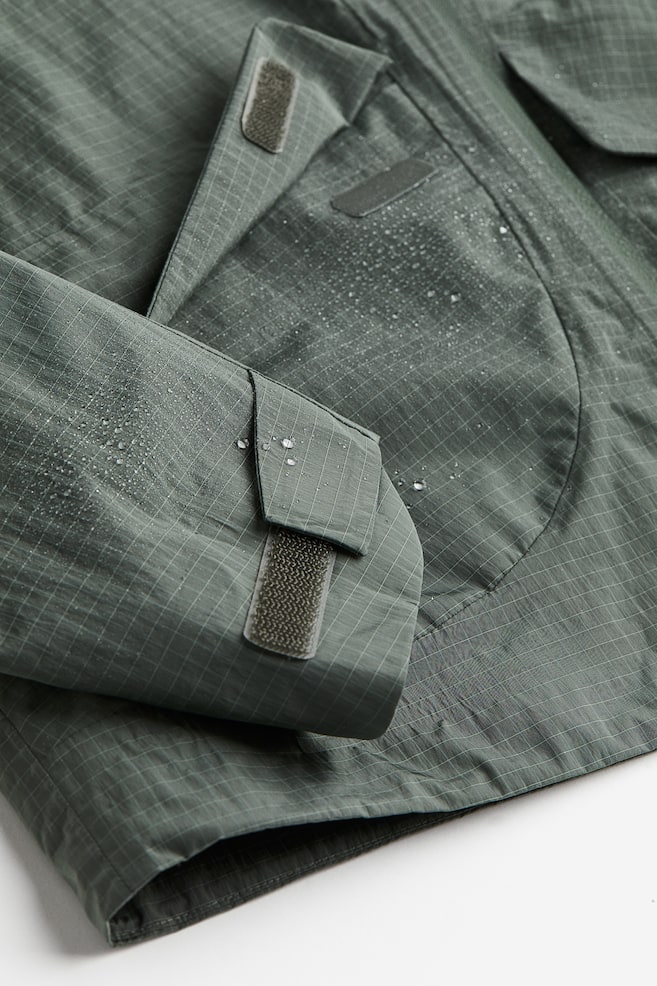 StormMove™ Cropped 2.5-layer shell jacket - Dark khaki green - 6