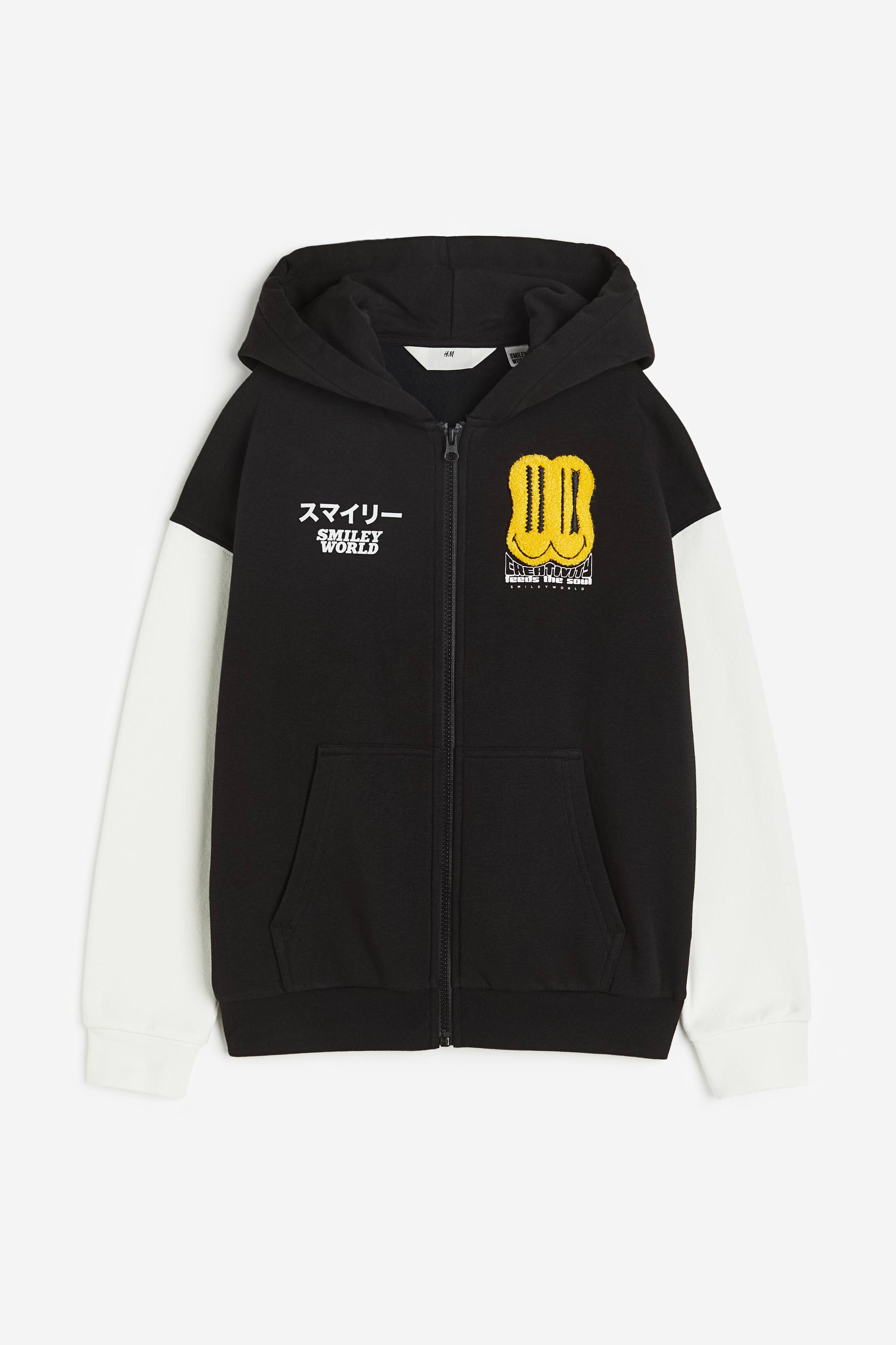 Büyük resmi görüntüle: Motif Detaylı Kapüşonlu ve Fermuarlı Üst - Siyah/SmileyWorld® - ÇOCUK | H&M TR 1