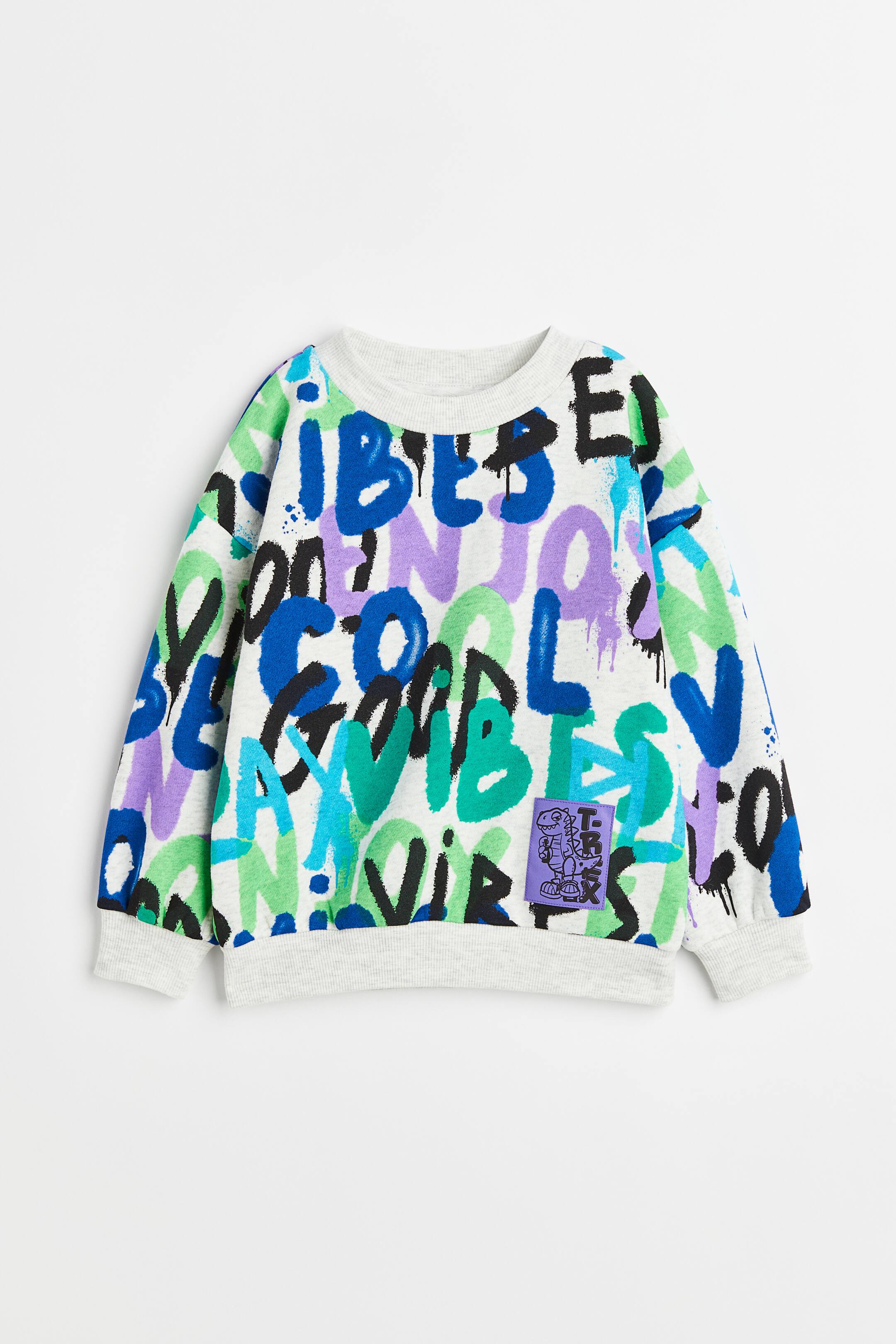 Xem ảnh lớn hơn: Áo nỉ dáng thụng - Màu xám nhạt/Graffiti - Kids | H&M VN 1