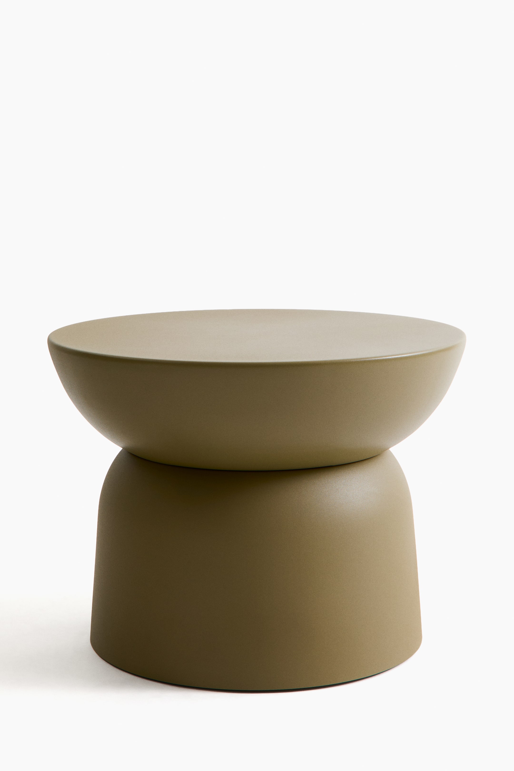 View larger image: The coffee table is shown from the front, featuring an olive-green, slightly textured metal surface. A shallow, inverted dome forms the top, which rests on a wider, rounded cylindrical base.