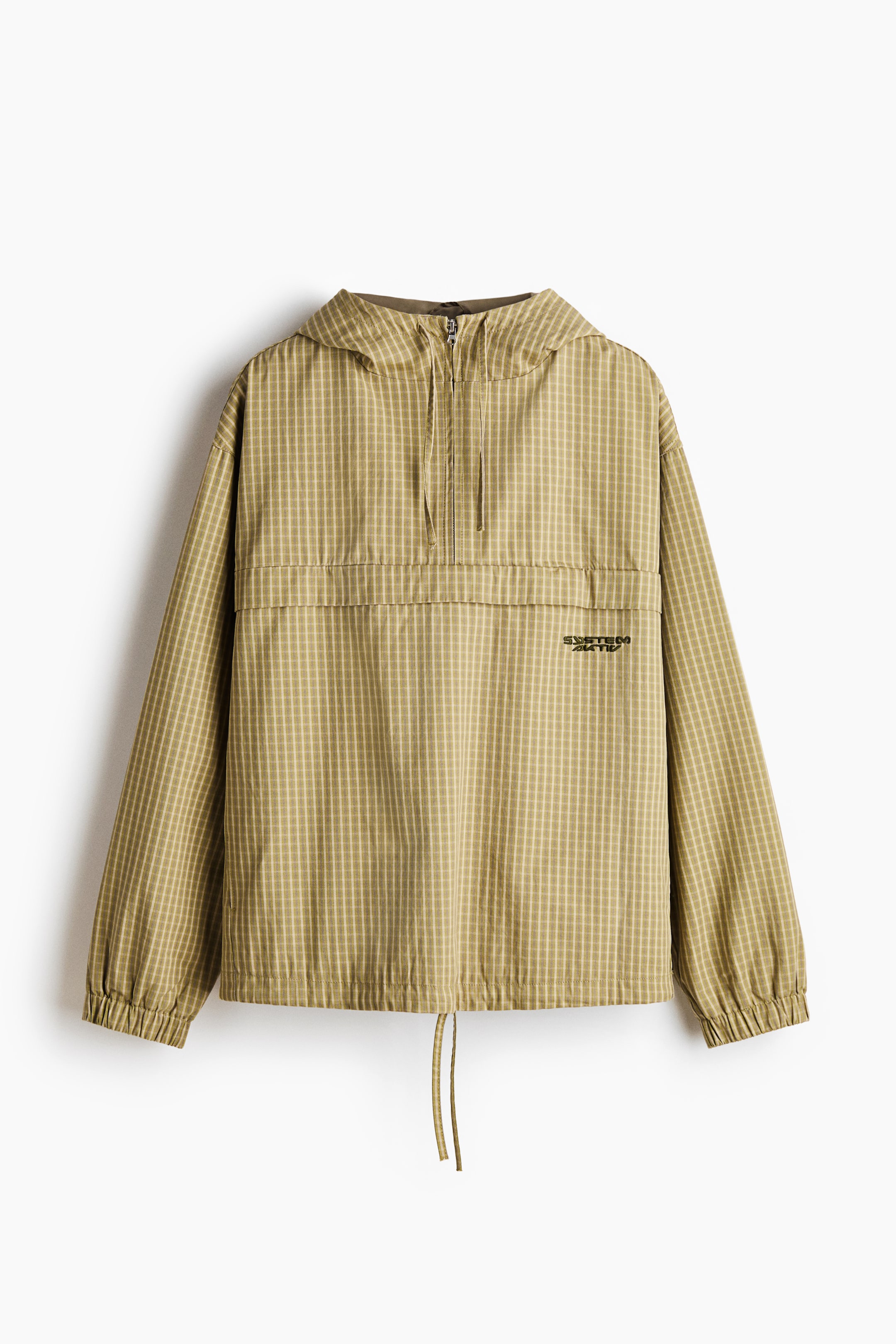 View larger image: A front view of an olive green hooded anorak is featuring a subtle grid pattern. It is designed with a half-zip closure, elasticated cuffs, and a drawstring hem, with a 'SYSTEMATIC' logo appearing on the chest.