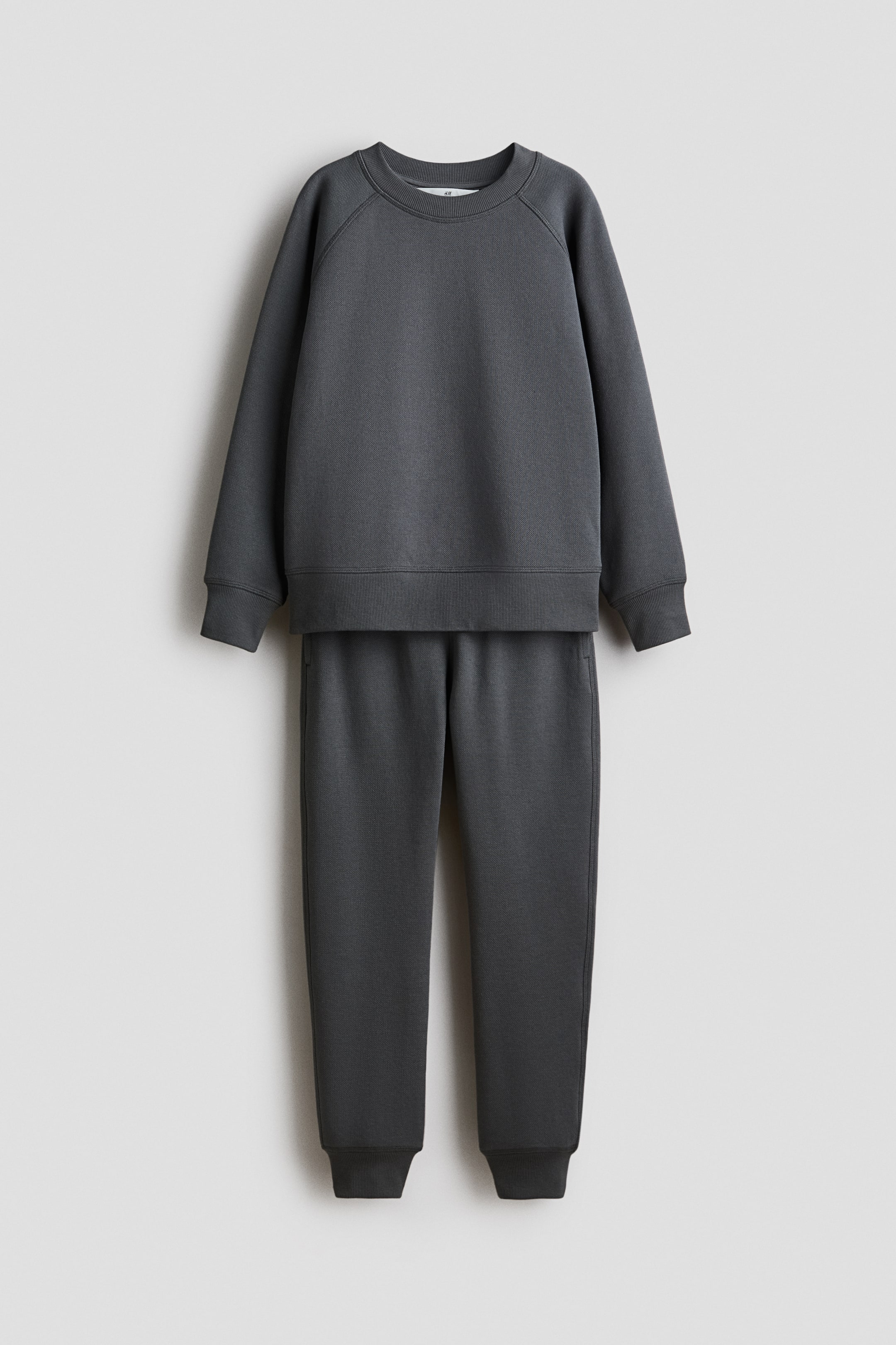 Visa större bild: 2-piece textured sweatshirt set - Mörkgrå - BARN | H&M FI 1