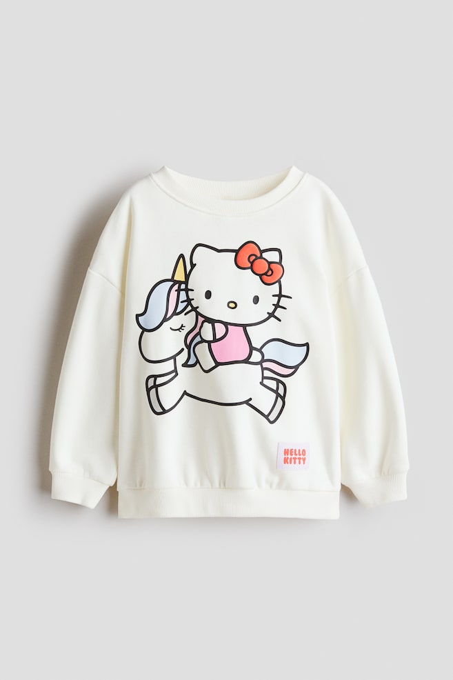 Printed Sweatshirt - White/Hello Kitty/Cream/Hello Kitty/Cream/Bluey/Cream/Hello Kitty/White/Peppa Pig/Light beige/Lilo & Stitch/White/Minnie Mouse/Light blue/Hello Kitty/Light blue/Cinnamoroll/Light purple/Hello Kitty/Light purple/pink/Pink/Hello Kitty/Gray melange/Lilo & Stitch/Turquoise/Gabby's Dollhouse - 1