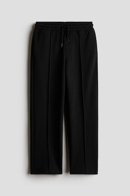 Joggers i piké med raka ben