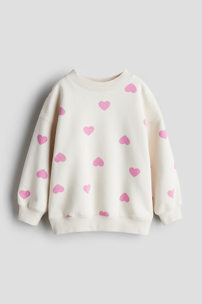 Sweatshirt oversize com o interior cardado - Branco/Corações/Cinzento escuro/Corações/Branco/Corações/Rosa/Corações/Creme/Bolas/Creme/Rosa claro/Corações - 1