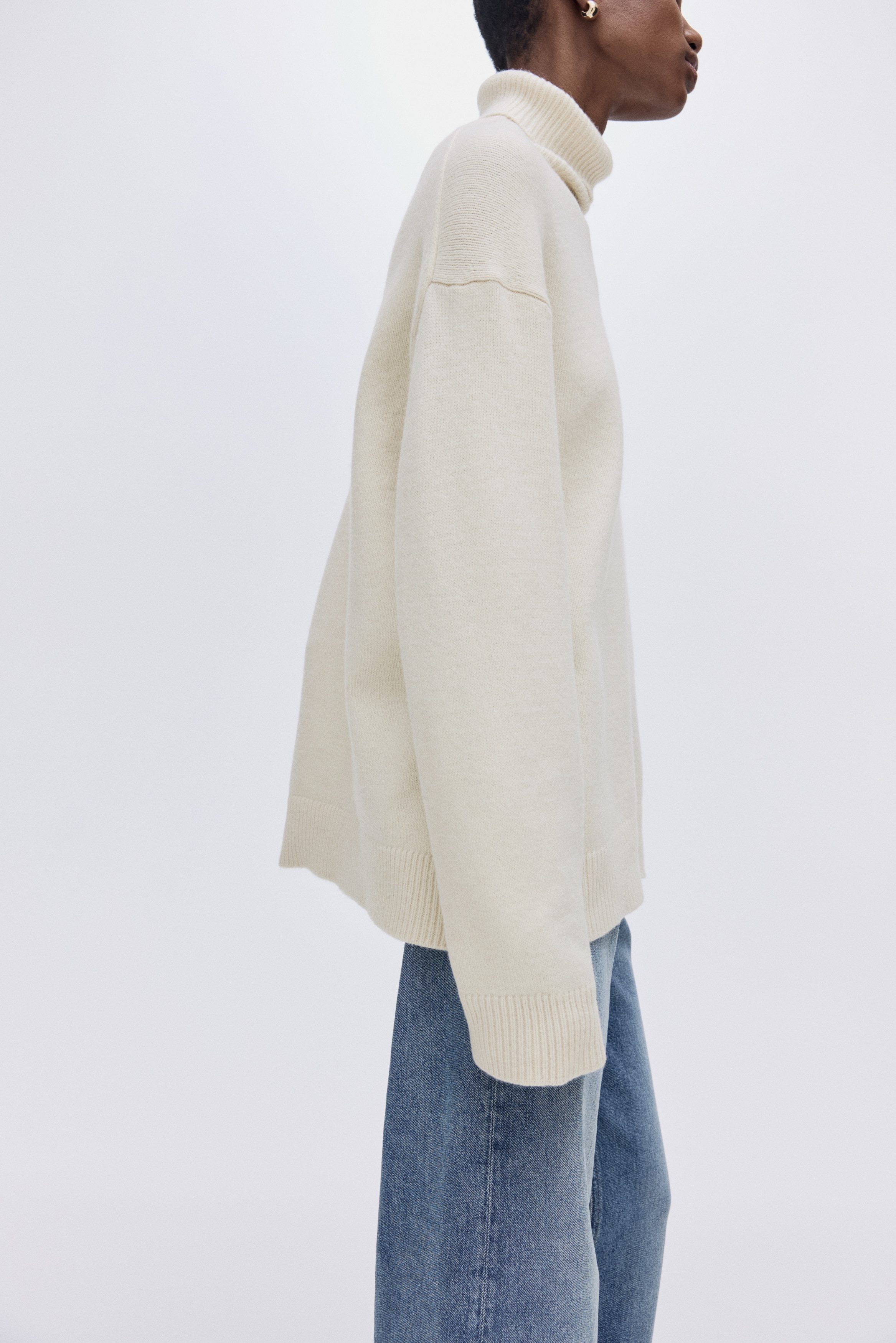 Loose-fit polo-neck jumper