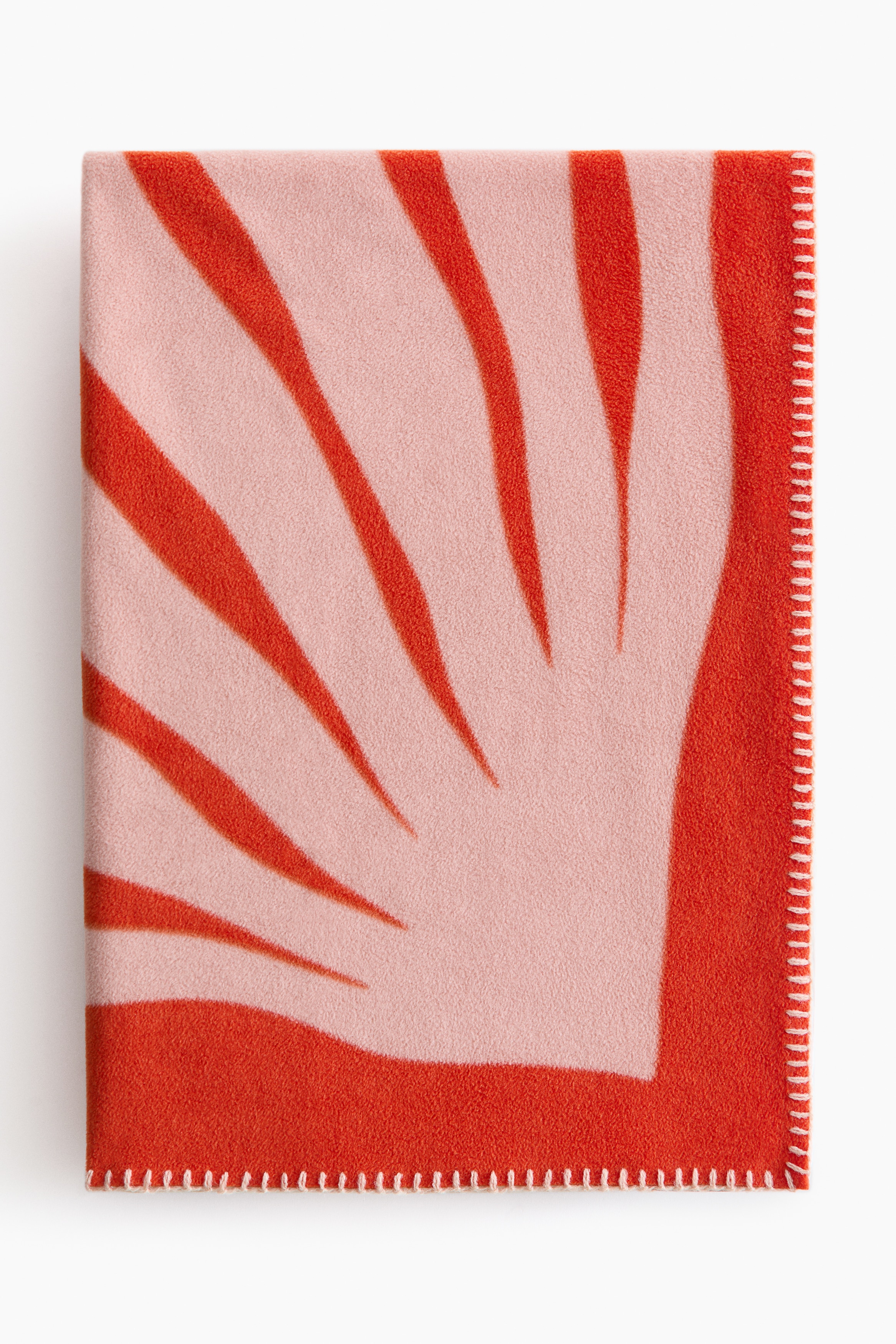 Patterned fleece blanketModel