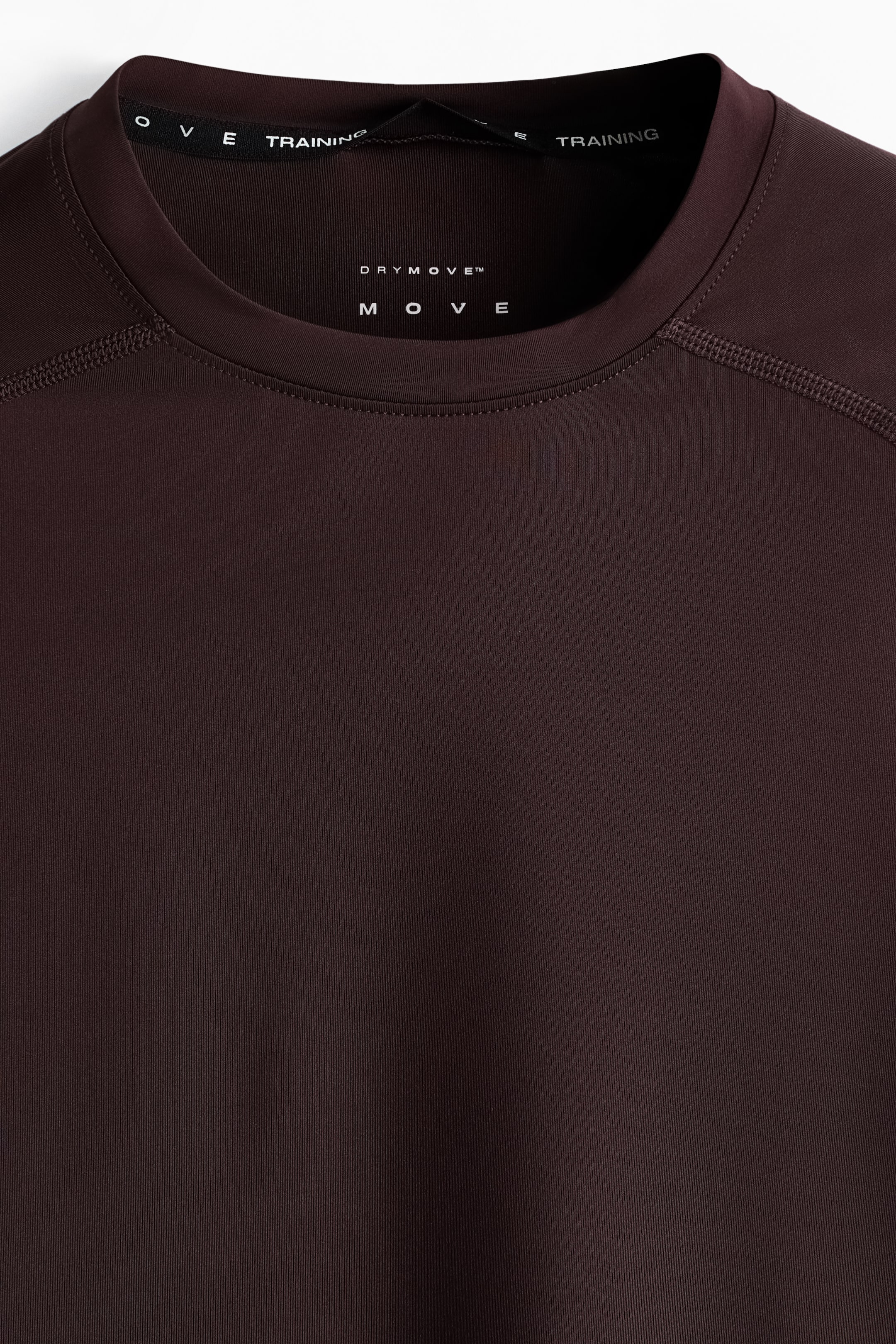 הצגת תמונה גדולה יותר: חולצת ספורט DryMove™‎ Muscle Fit‎ - חום כהה - Men | H&M IL 3