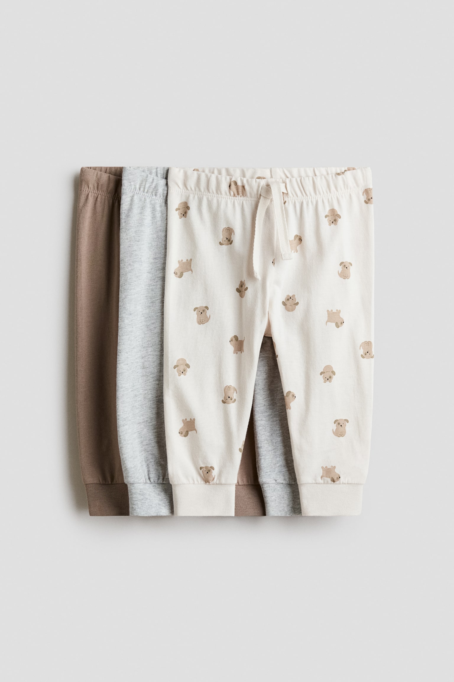 Lot de 3 pantalons jogger en jersey de coton - Marron/chiens/Gris clair/turquoise/Beige/dinosaures/Vert clair/voitures/Beige clair/gris
