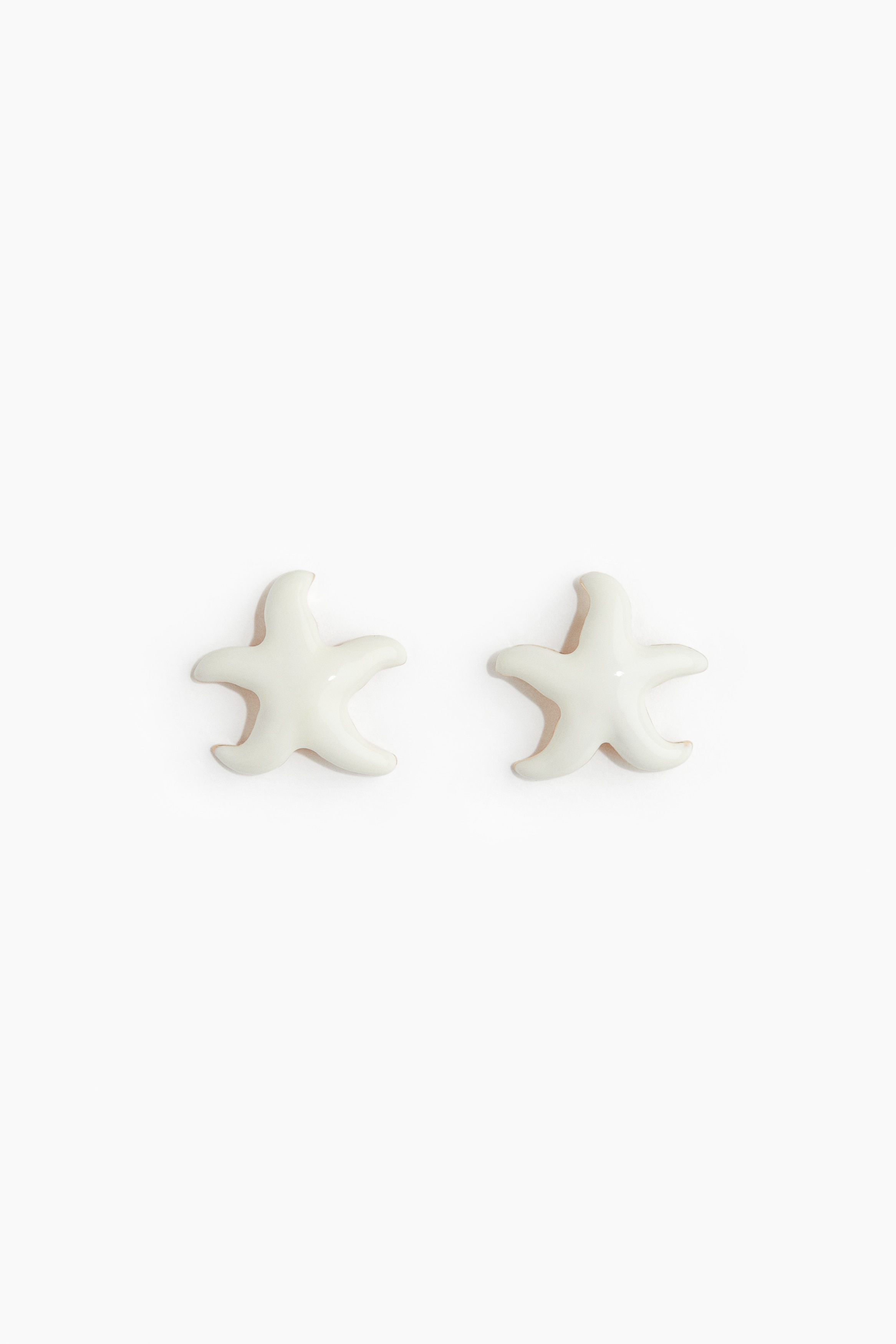 Starfish-shaped earrings - White