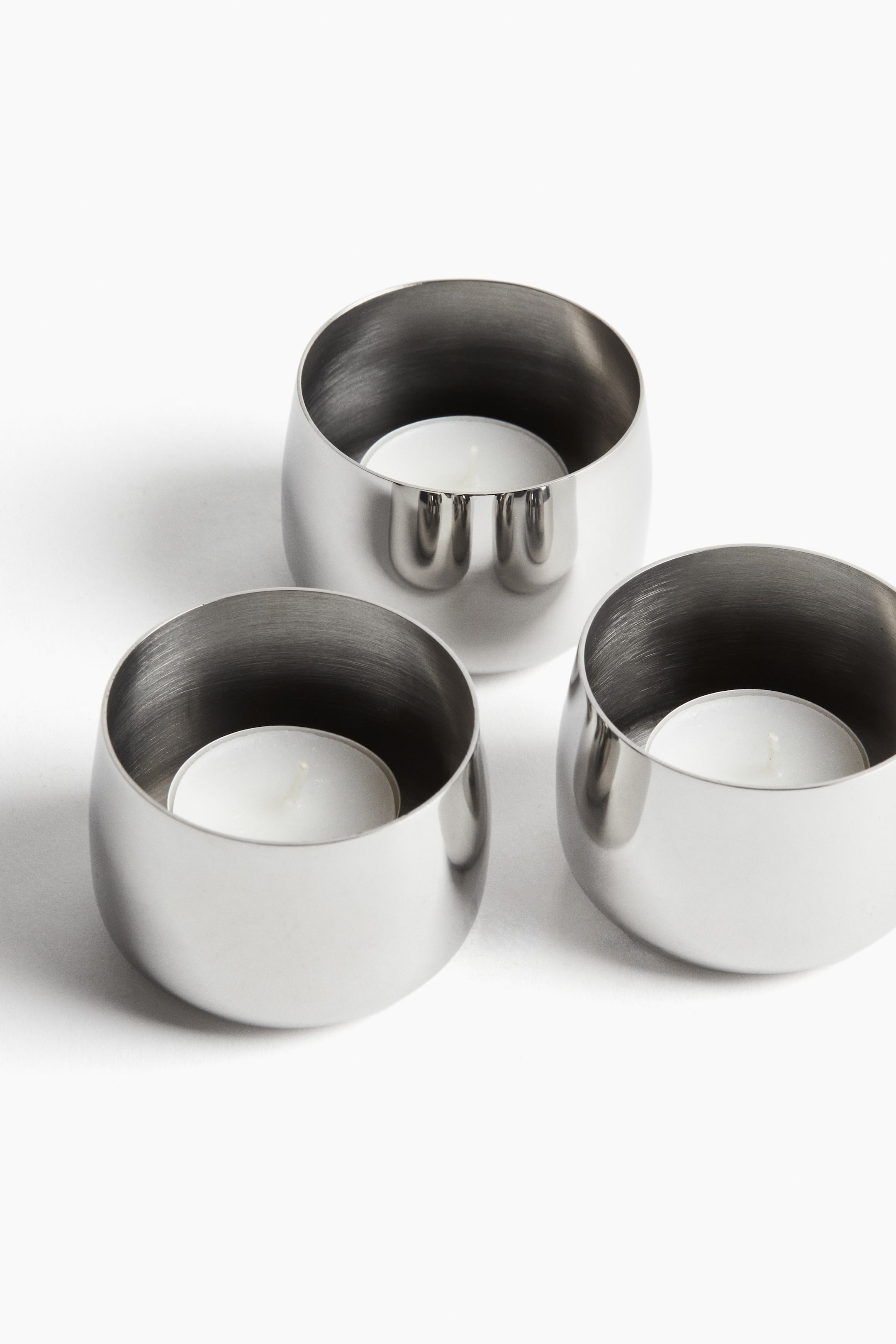 Visa större bild: 3-pack ljushållare för värmeljus i metall - Silver - Home All | H&M SE 3