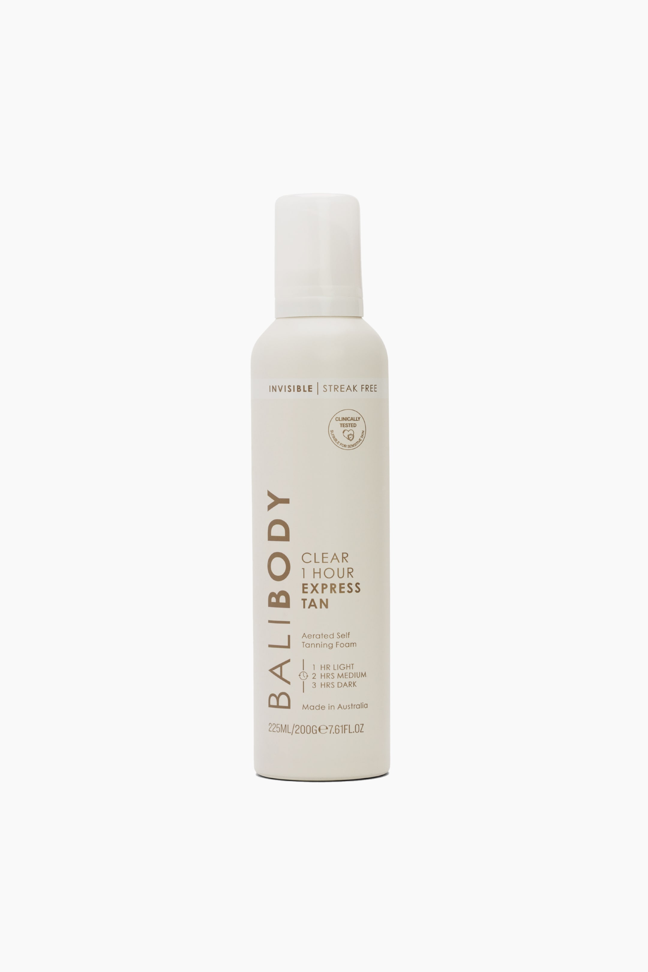 Se større billede: En lys off-white cylindrisk flaske med Bali Body Clear 1 Hour Express Tan står oprejst og vender fremad. Flasken viser "BALIBODY" lodret på siden og "CLEAR 1 HOUR EXPRESS TAN" fremtrædende, med synlige instruktioner for forskellige tan-intensiteter.