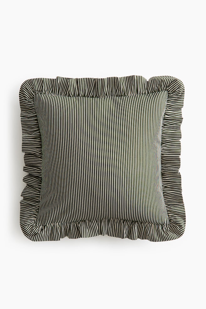 A square throw pillow is facing front, displaying a pattern of thin, vertical dark green and off-white stripes. The pillow is featuring a wide, ruffled trim along all four sides in the matching striped fabric. - 1