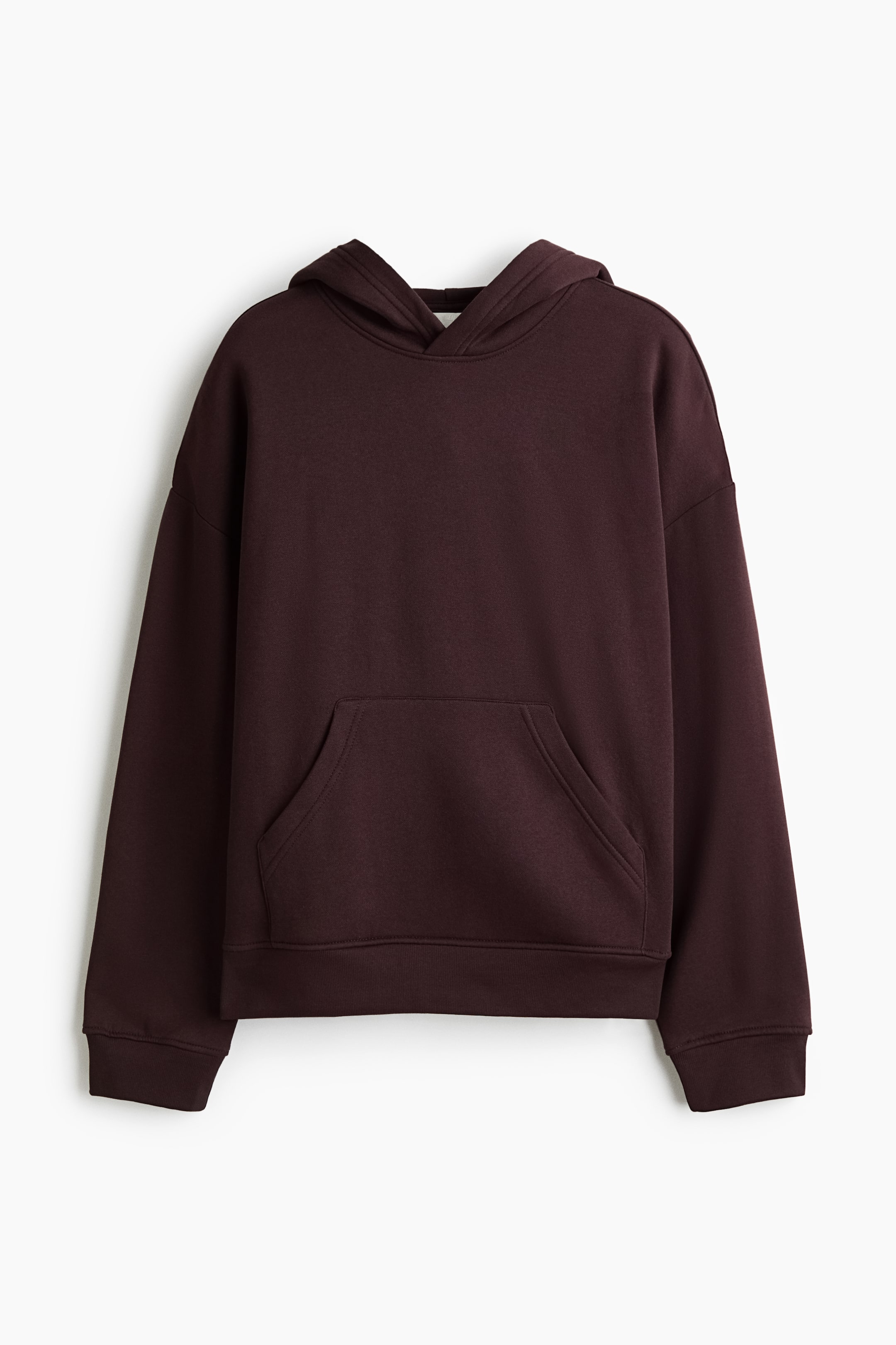 View larger image: A dark burgundy sweatshirt hoodie is shown from the front, featuring a double-layer hood, dropped shoulders, and a front kangaroo pocket. This long-sleeved garment is finished with ribbed cuffs and a matching ribbed hem.