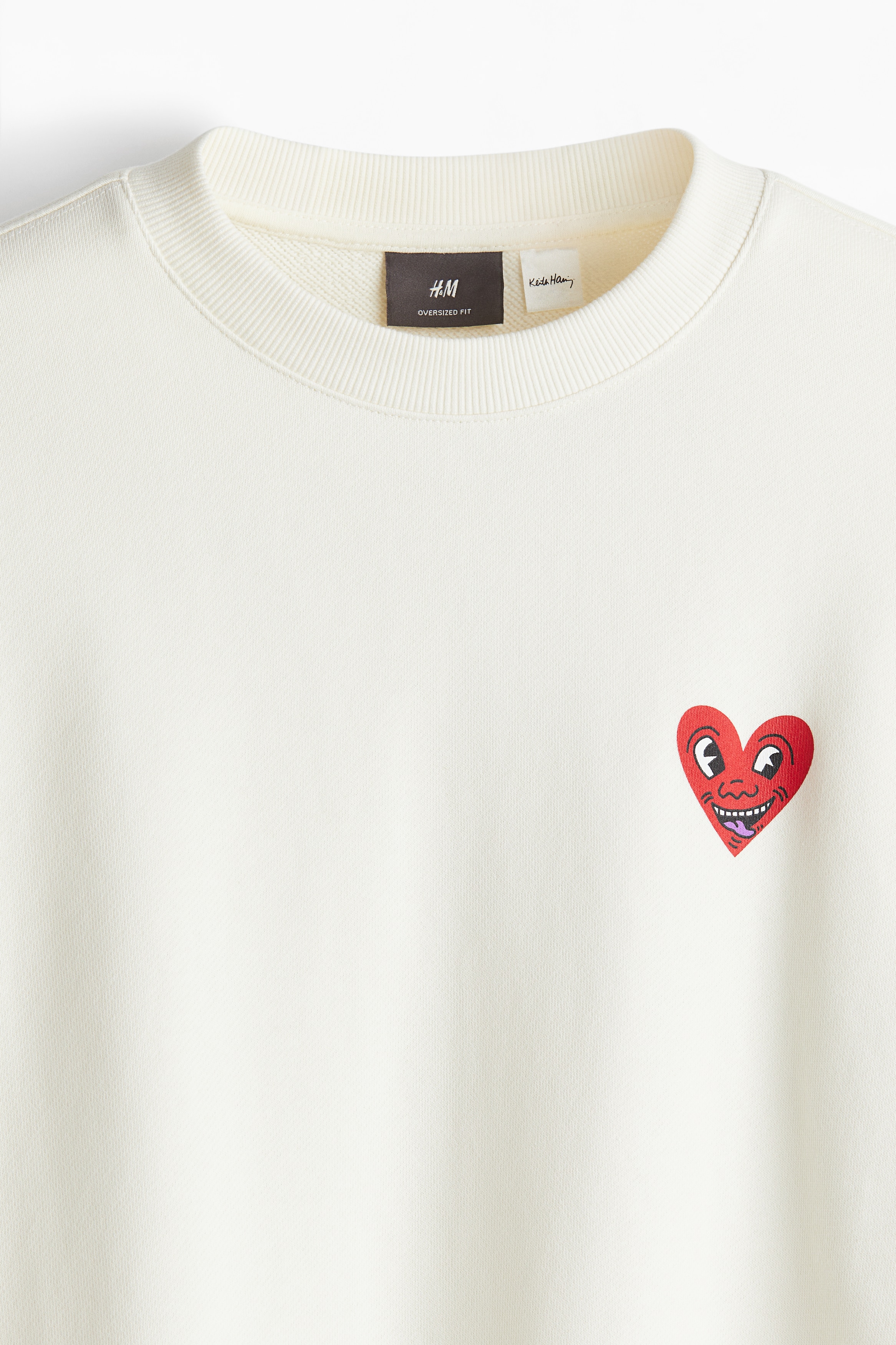 Men's White/Keith Haring Oversized Fit Printed sweatshirt | H&M IN