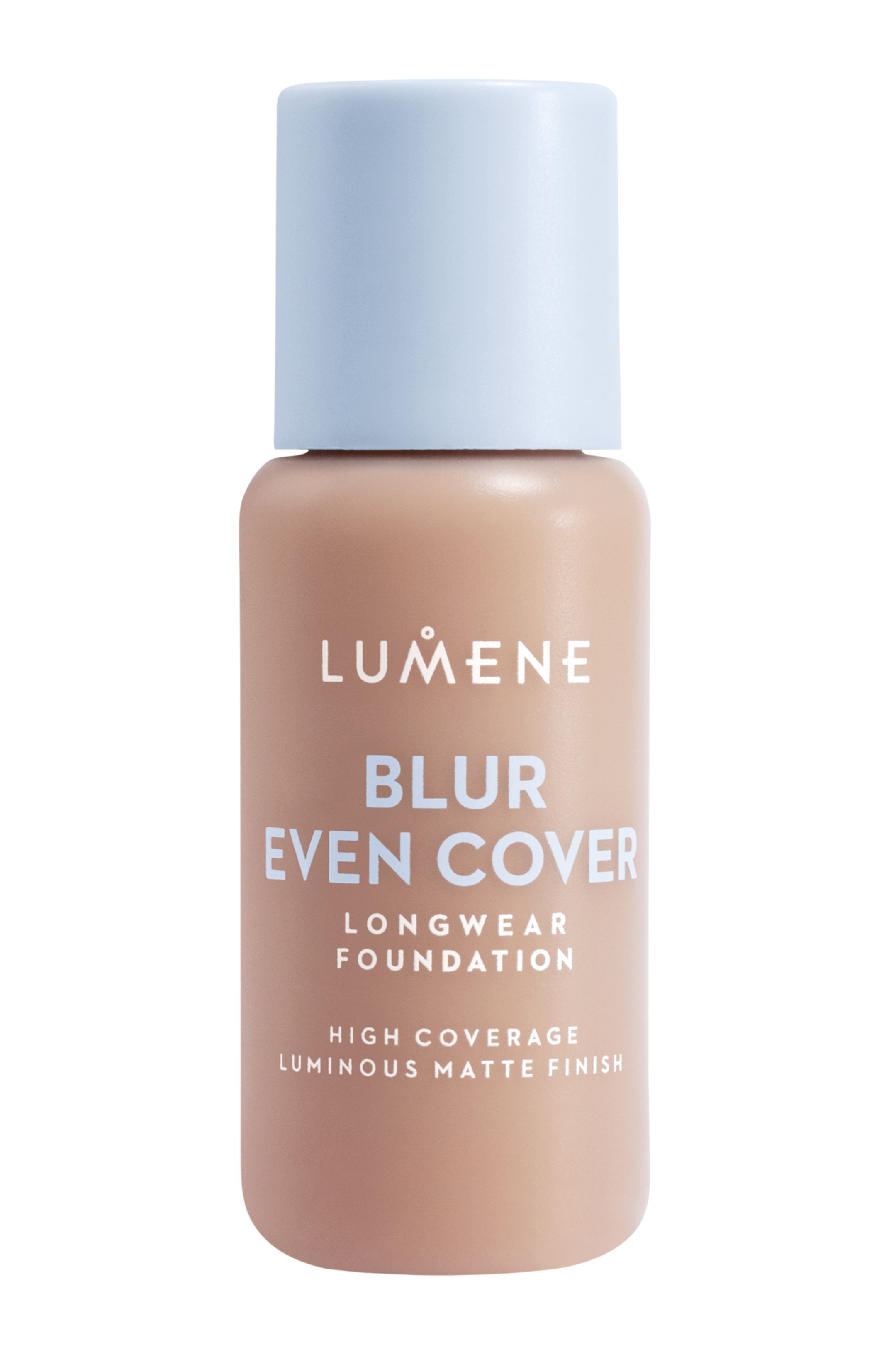 Se større billede: En lysebrun foundationflaske står oprejst med en lyseblå cylindrisk hætte. Hvid tekst på flasken viser 'Lumene Blur Even Cover Longwear Foundation High Coverage Luminous Matte Finish'.