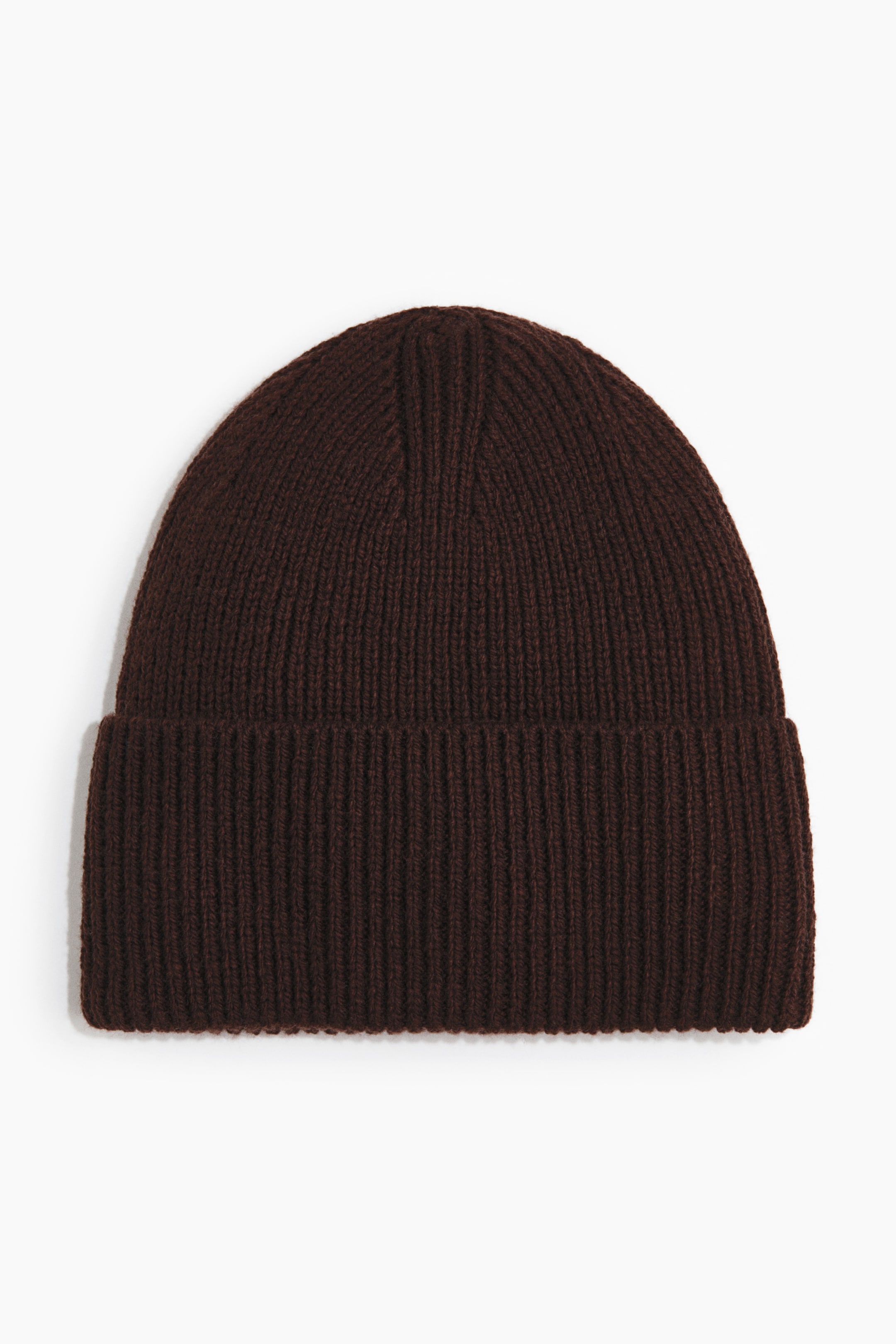 View larger image: A dark brown beanie is facing front, featuring a ribbed knit texture throughout its main body and folded brim.