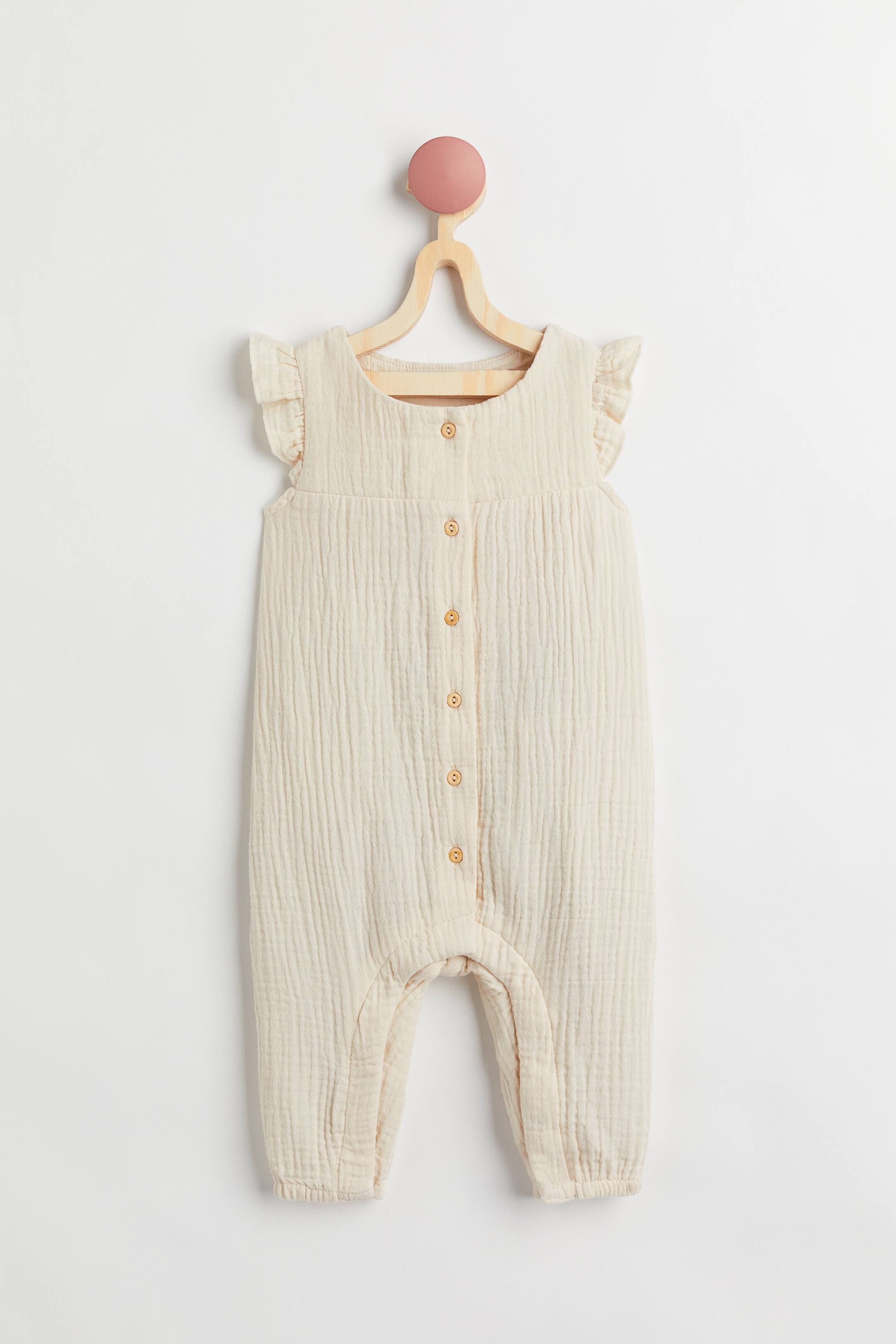 View larger image: Cotton romper suit - Cream - Kids | H&M 1