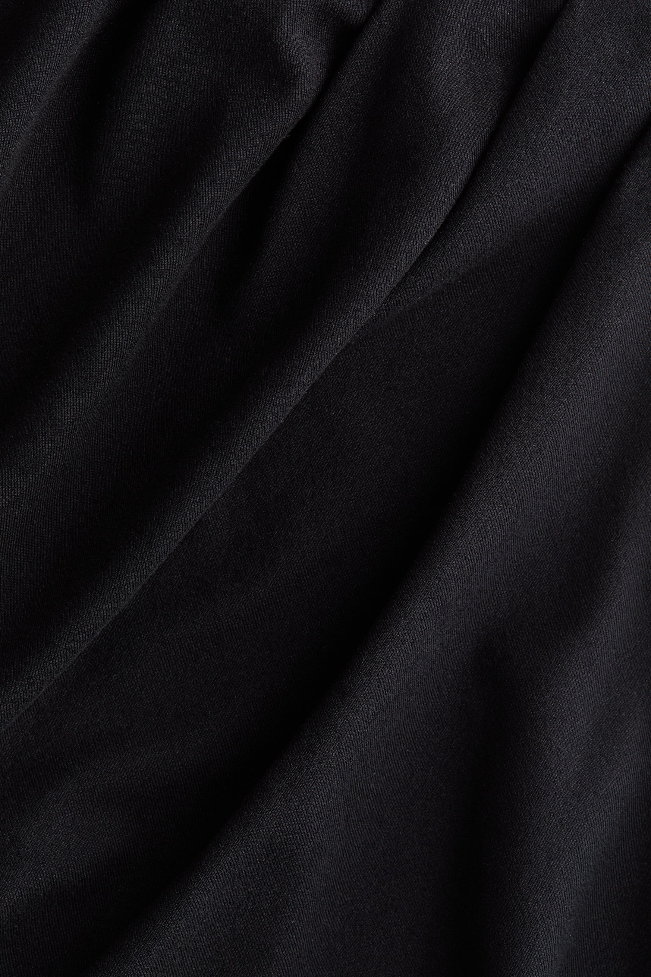 Draped Asymmetric Top
