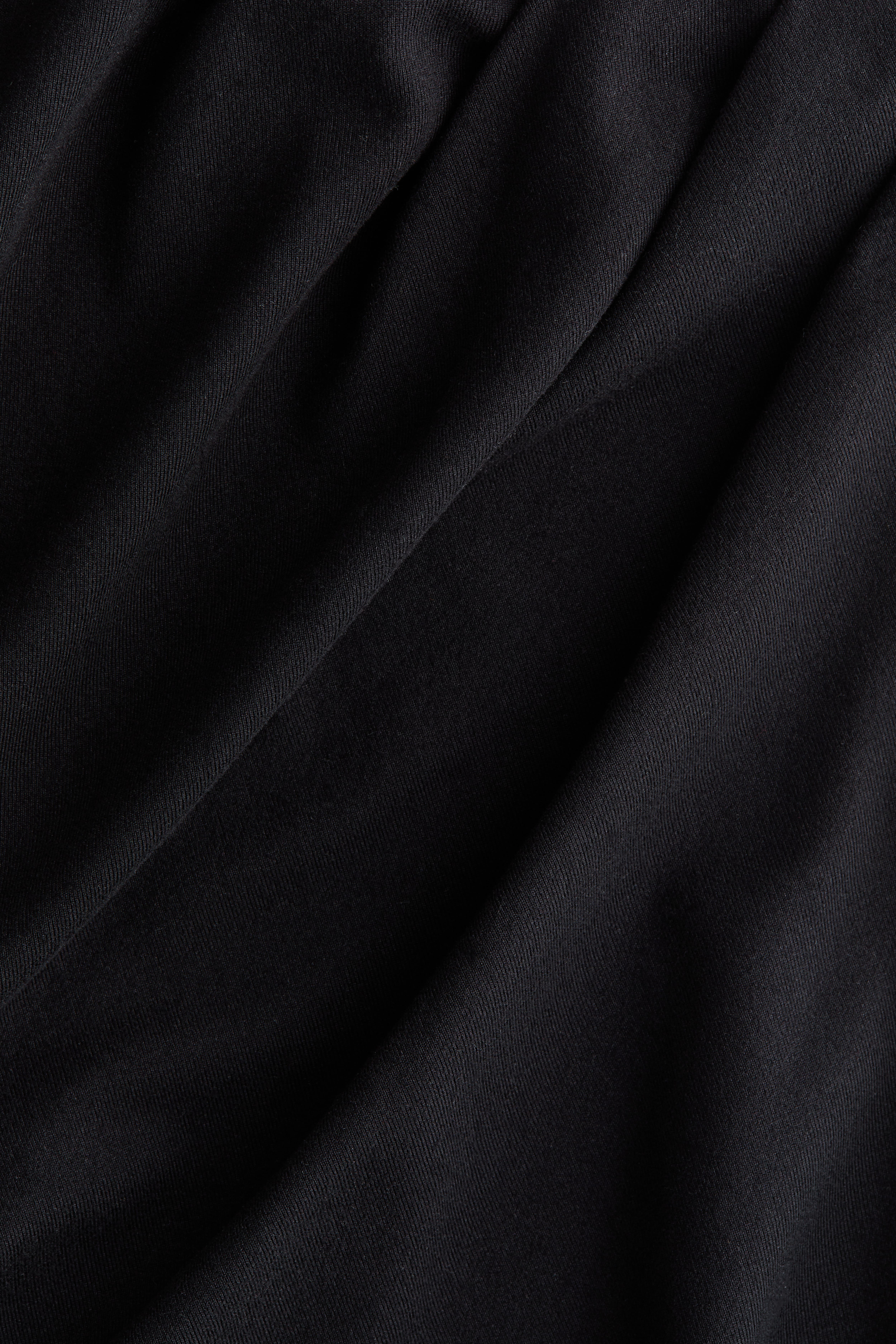 Draped Asymmetric Top