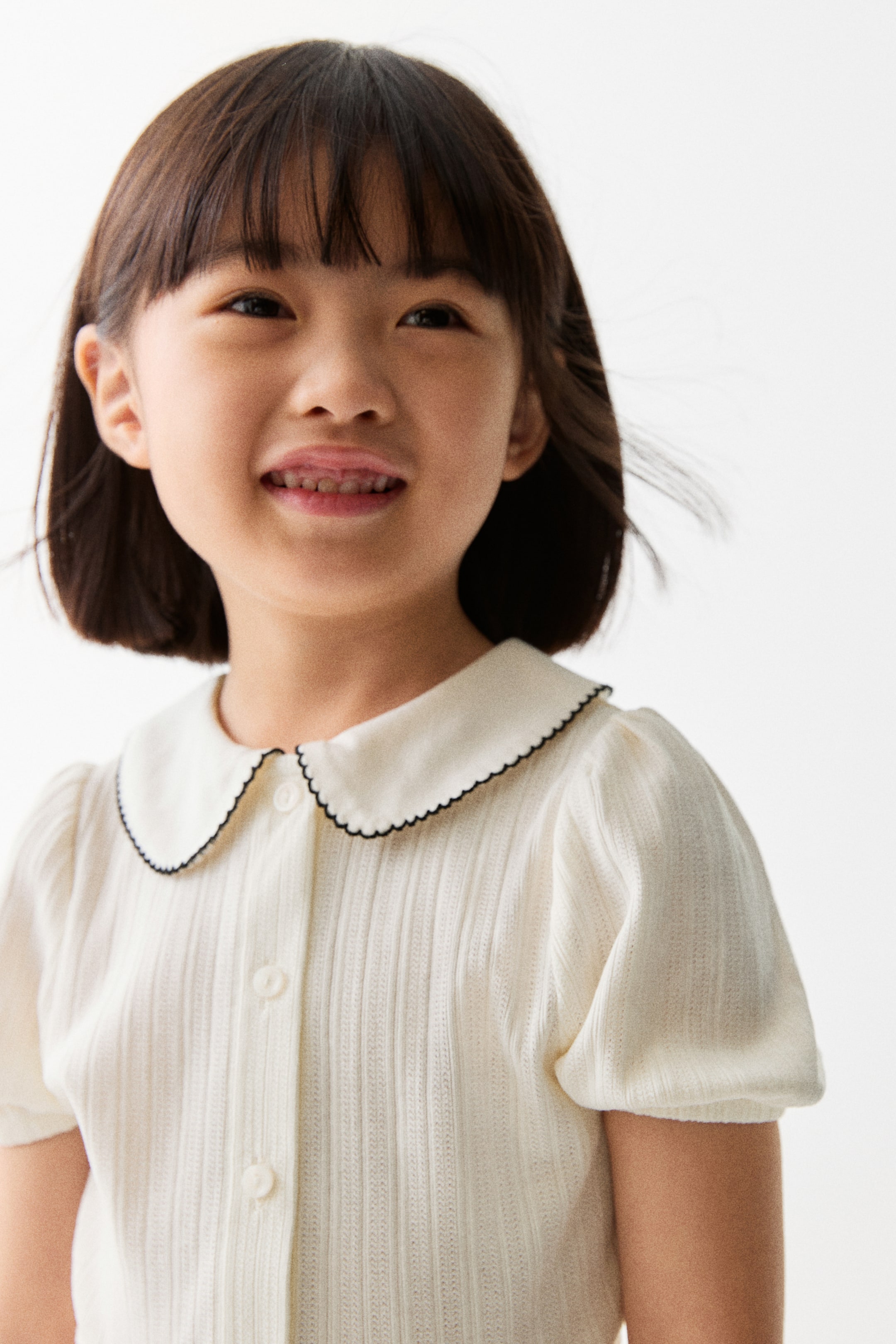 Xem ảnh lớn hơn: Short-sleeved pointelle blouse - Màu trắng - Kids | H&M VN 1