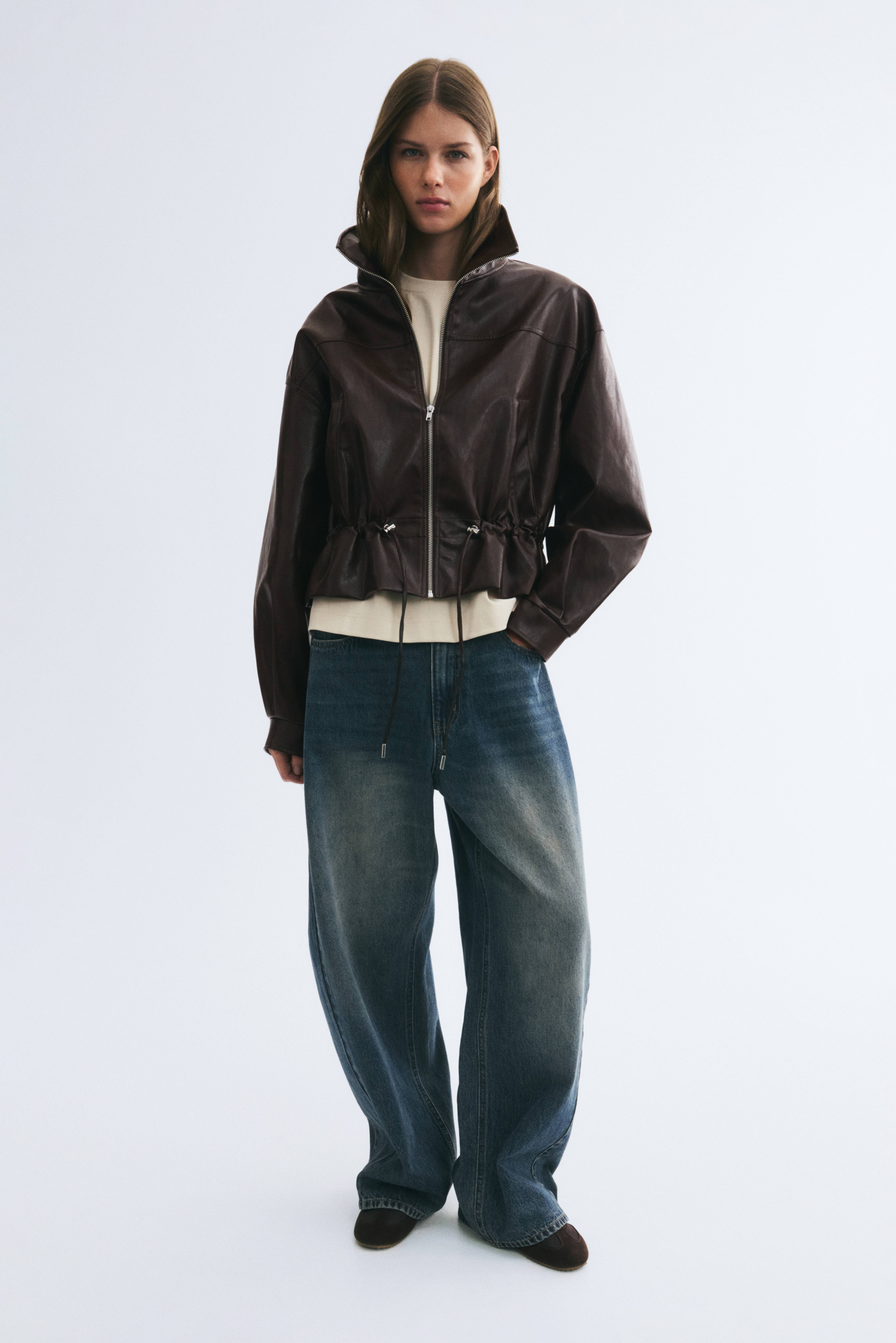 Veste à col droit en tissu enduit