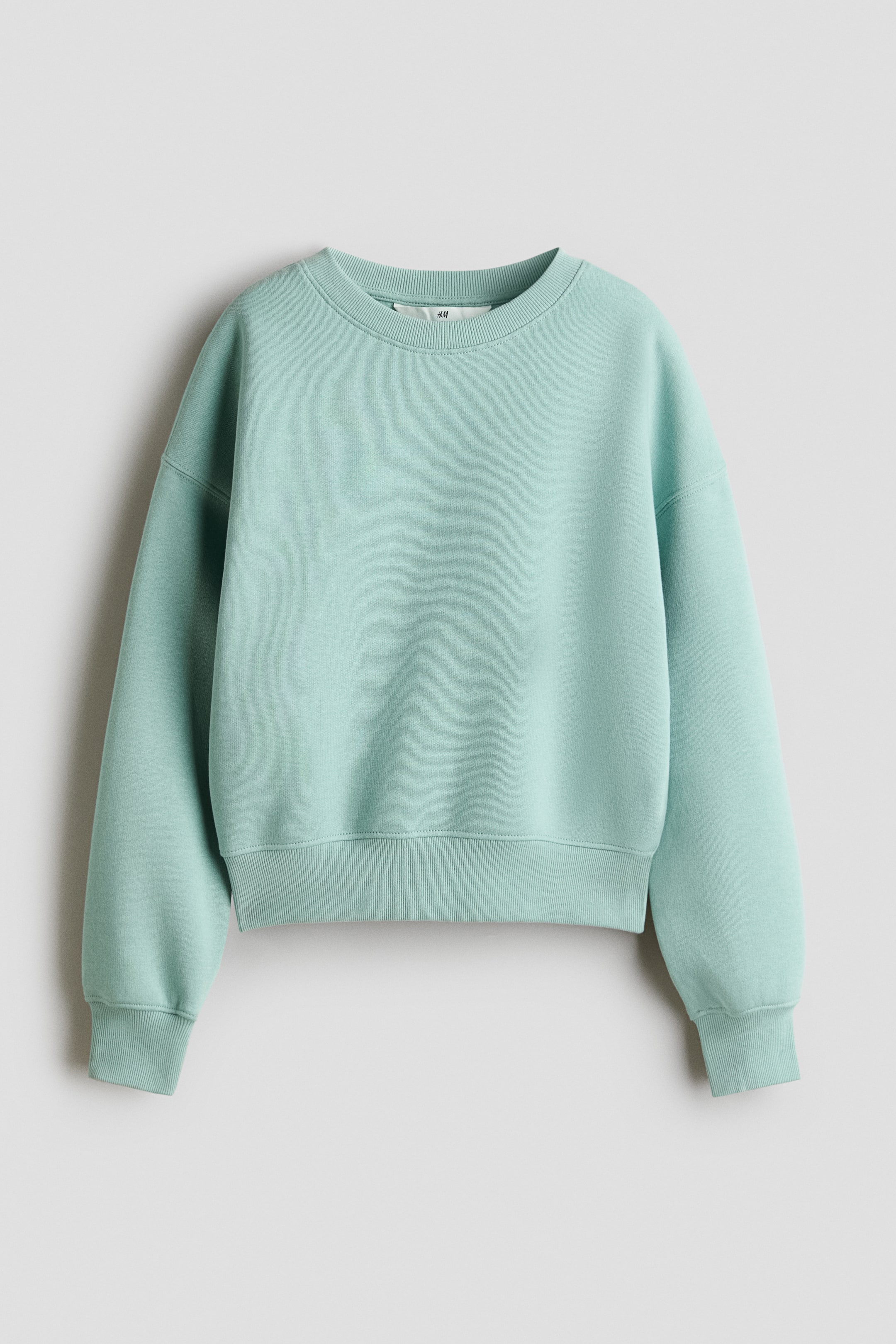 View larger image: Brushed-inside sweatshirt - Light dusty turquoise - Kids | H&M 1