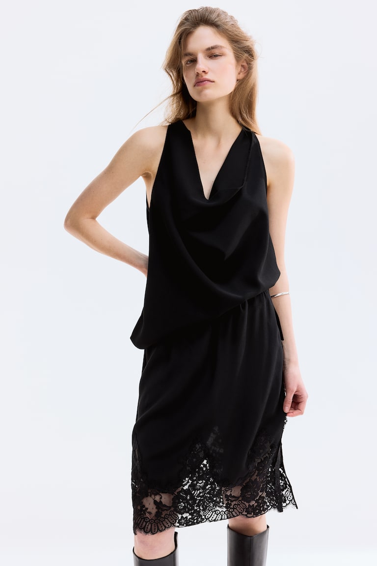 Bluza s drapiranim izrezom