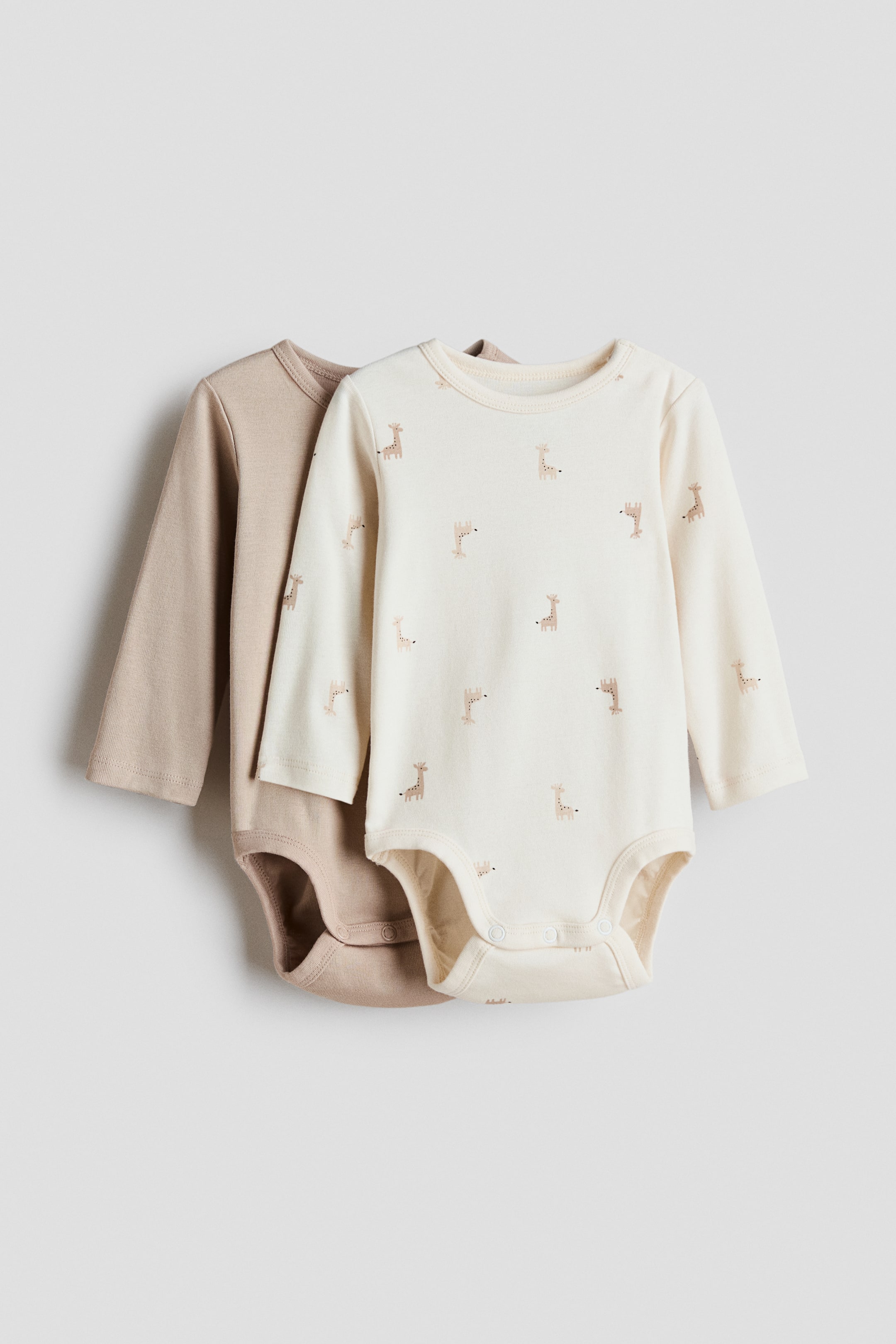 拡大画像を表示: 長袖ボディスーツ 2枚セット - ベージュ/ジラフ - Kids | H&M JP 1