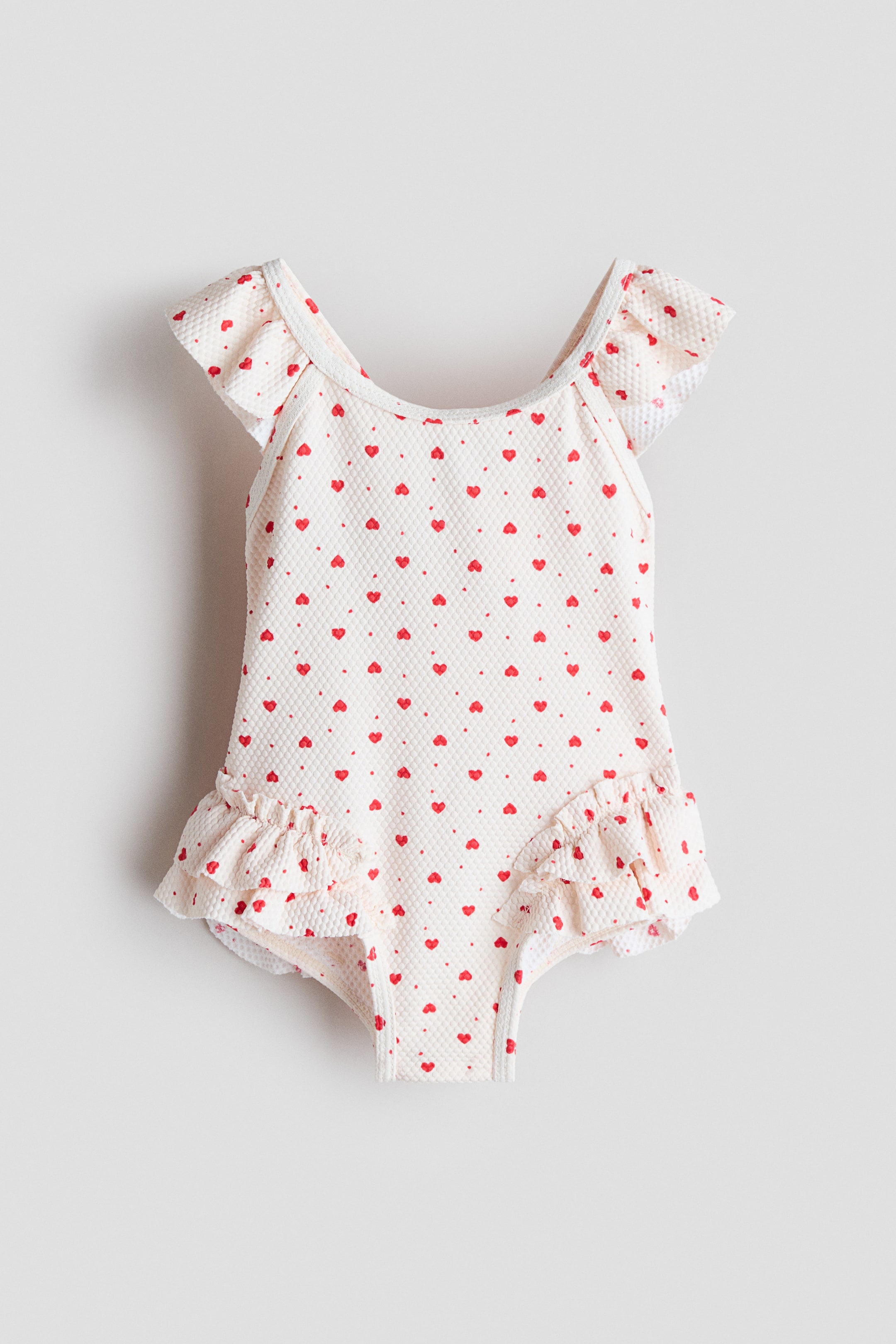 Προβολή μεγαλύτερης εικόνας: Ολόσωμο μαγιό με βολάν - Ανοιχτό μπεζ/καρδιές - Kids | H&M GR 1