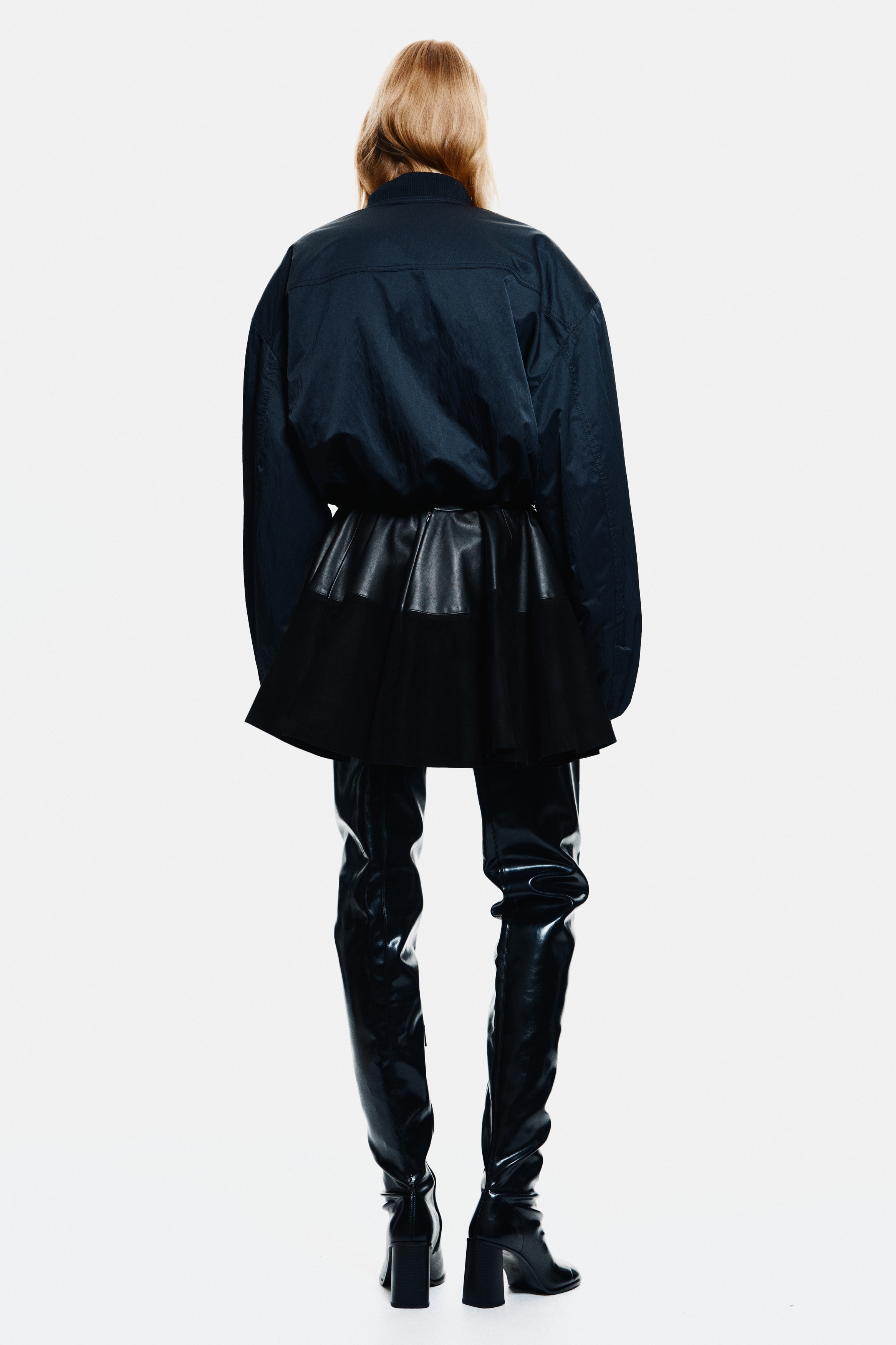 Circular leather mini skirt