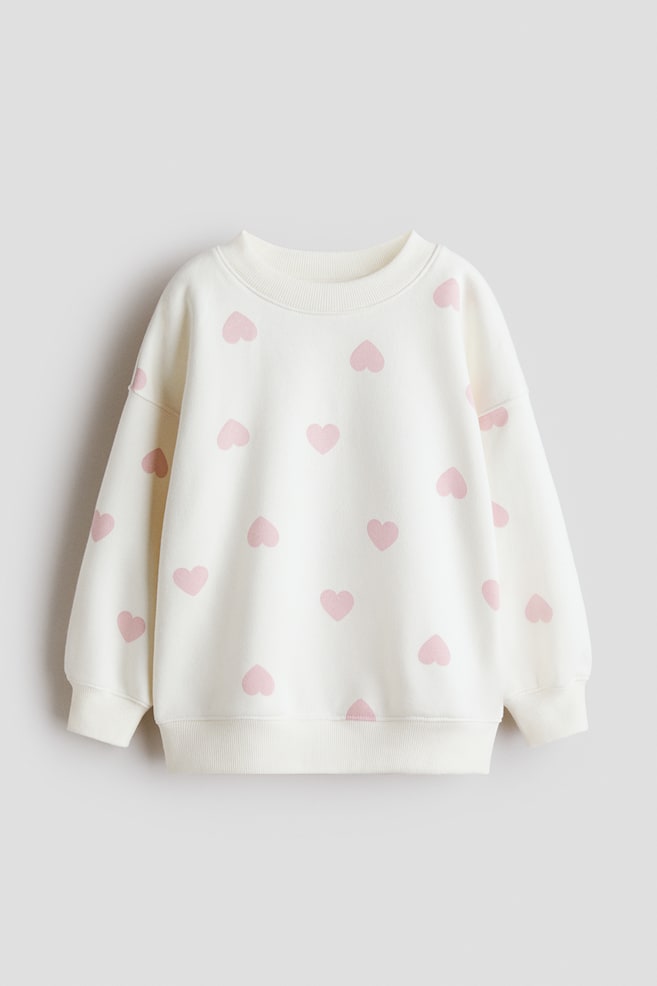 Oversized Sweatshirt mit angerauter Innenseite - Weiss/Herzen/Helles Mattrosa/Helllila/Blau/Herzen/Rosa/Herzen/Dunkelrosa/Cremefarben/Dunkelgrau/Herzen/Mattlila/Leopardenmuster/Rosa/Weiss gestreift/Cremefarben/Gepunktet - 1