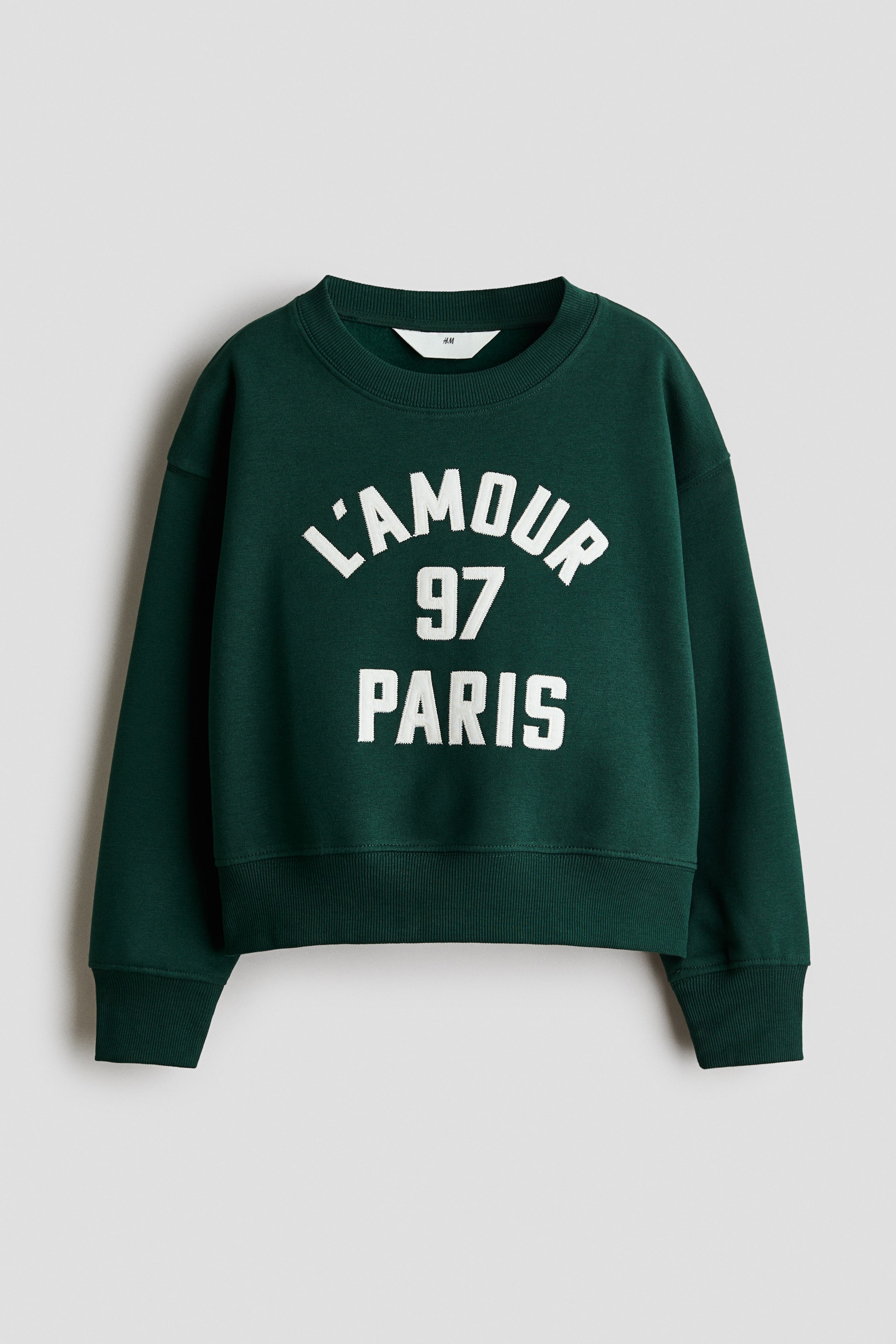 View larger image: Brushed-inside sweatshirt - Dark green/L'Amour Paris - Kids | H&M 1