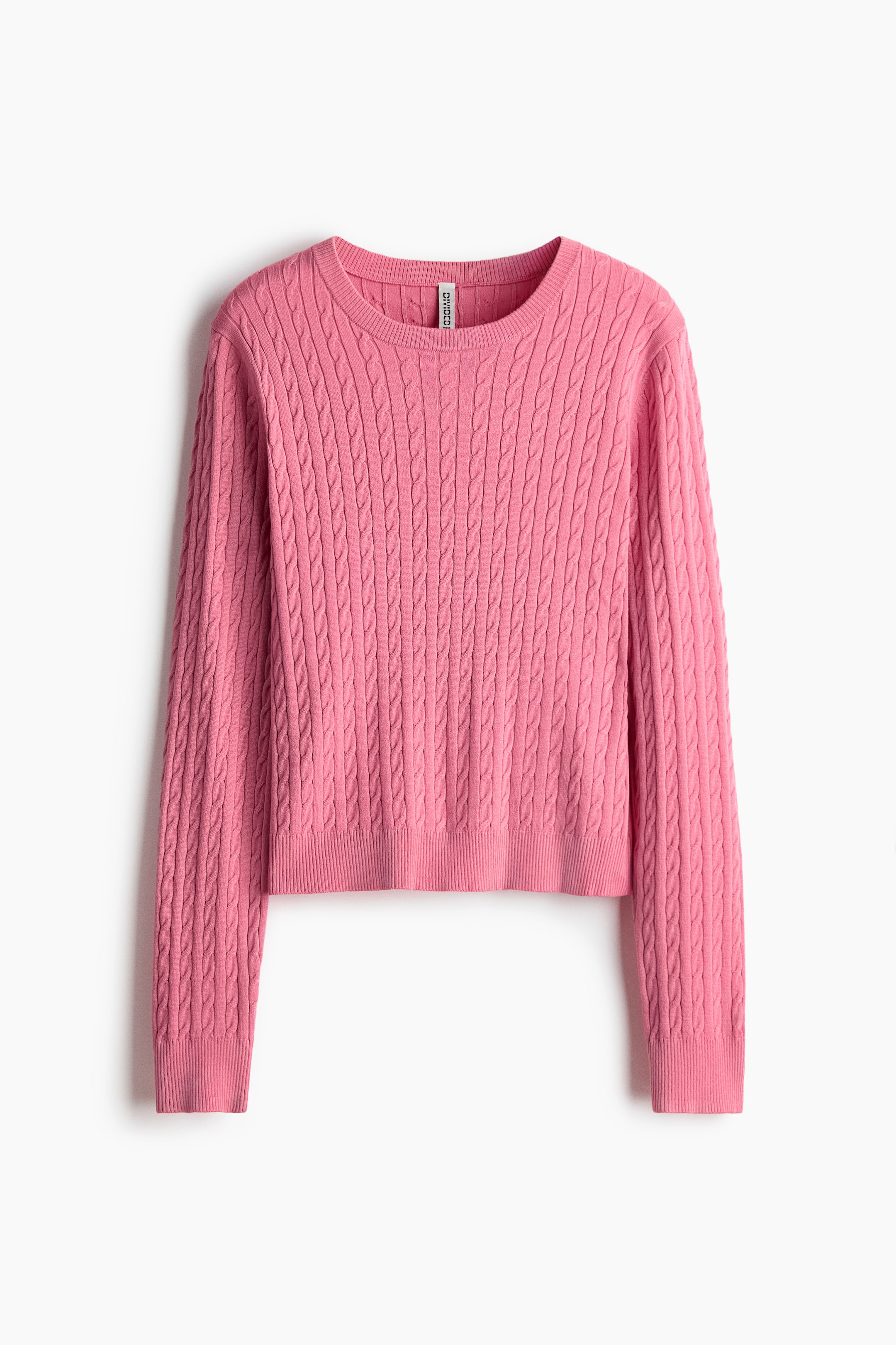 View larger image: A pink jumper is presented facing FRONT, showcasing a cable-knit pattern across its body and long sleeves. It features a round, ribbed neckline, ribbed cuffs, and a ribbed hem.
