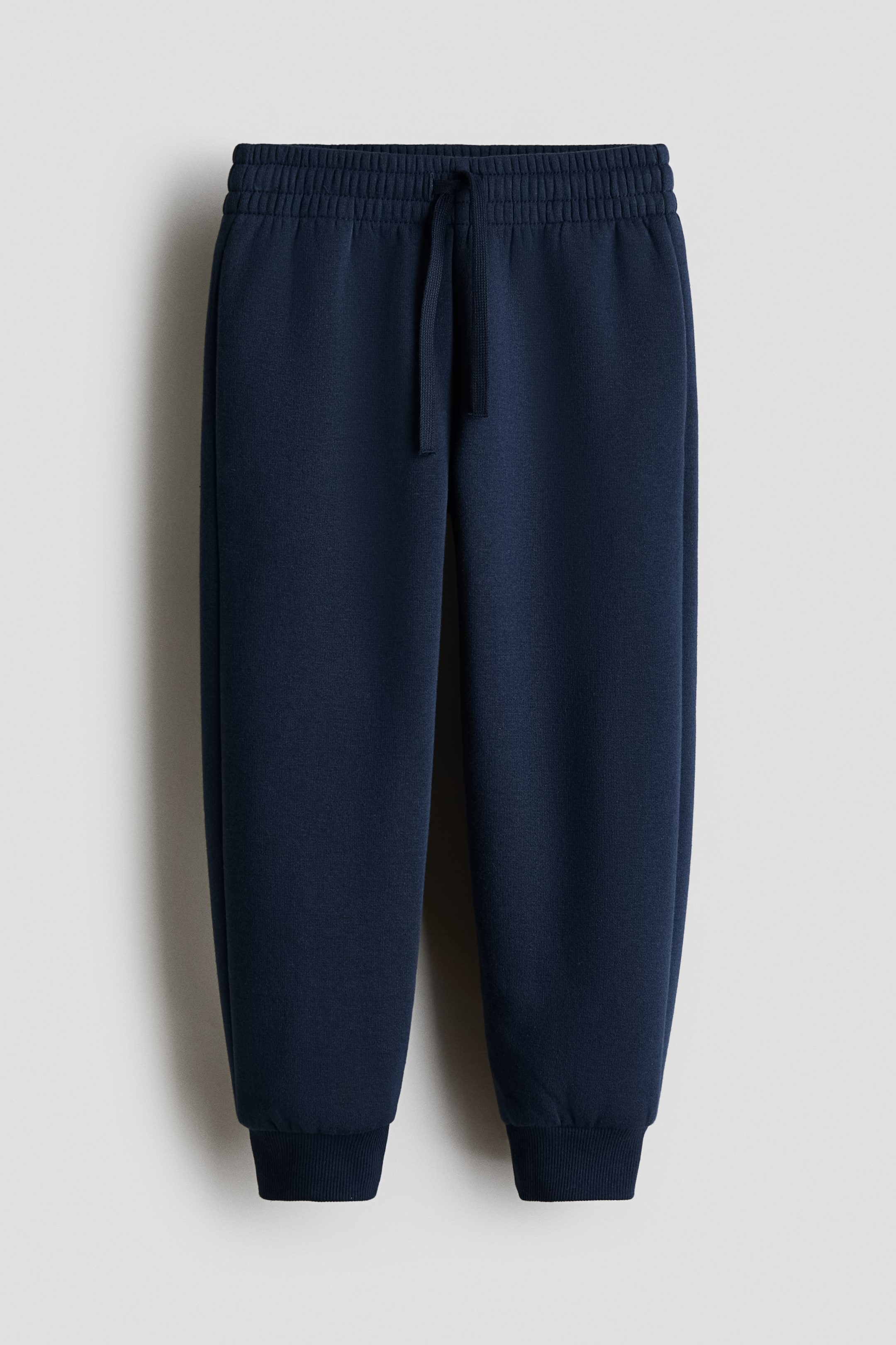 View larger image: Brushed-inside joggers - Navy blue - Kids | H&M SG 1