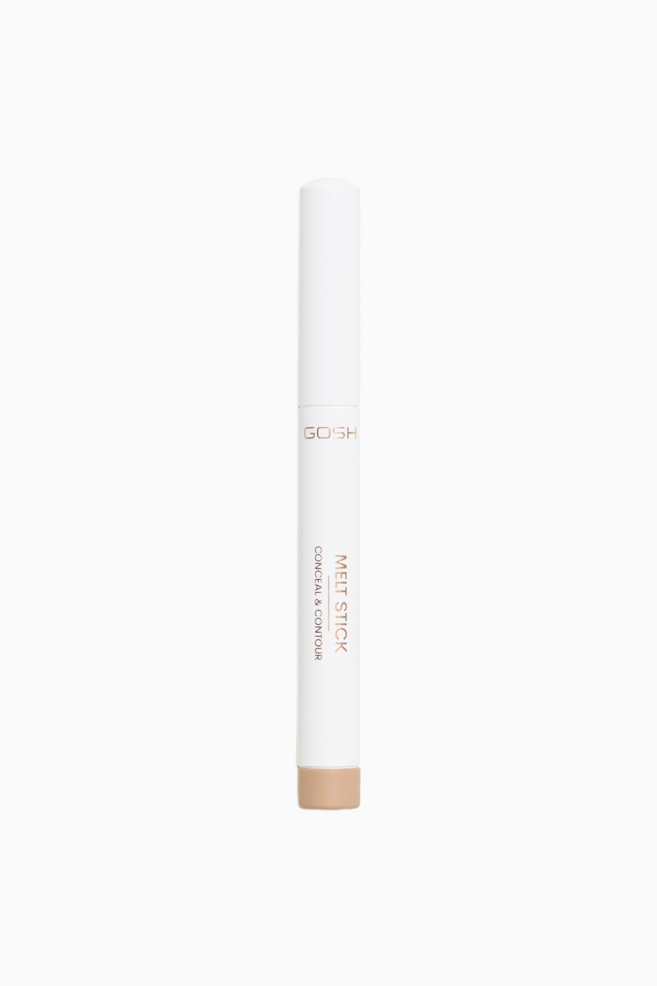 Visa större bild: Melt Stick Conceal & Contour står lodrätt och visar upp ett slankt, vitt cylindriskt hölje med ett matchande lock. Produkten har roséguldfärgad metallictext på framsidan med texten "GOSH" och "MELT STICK CONCEAL & CONTOUR", samt en beige nyansindikator vid nederkanten.