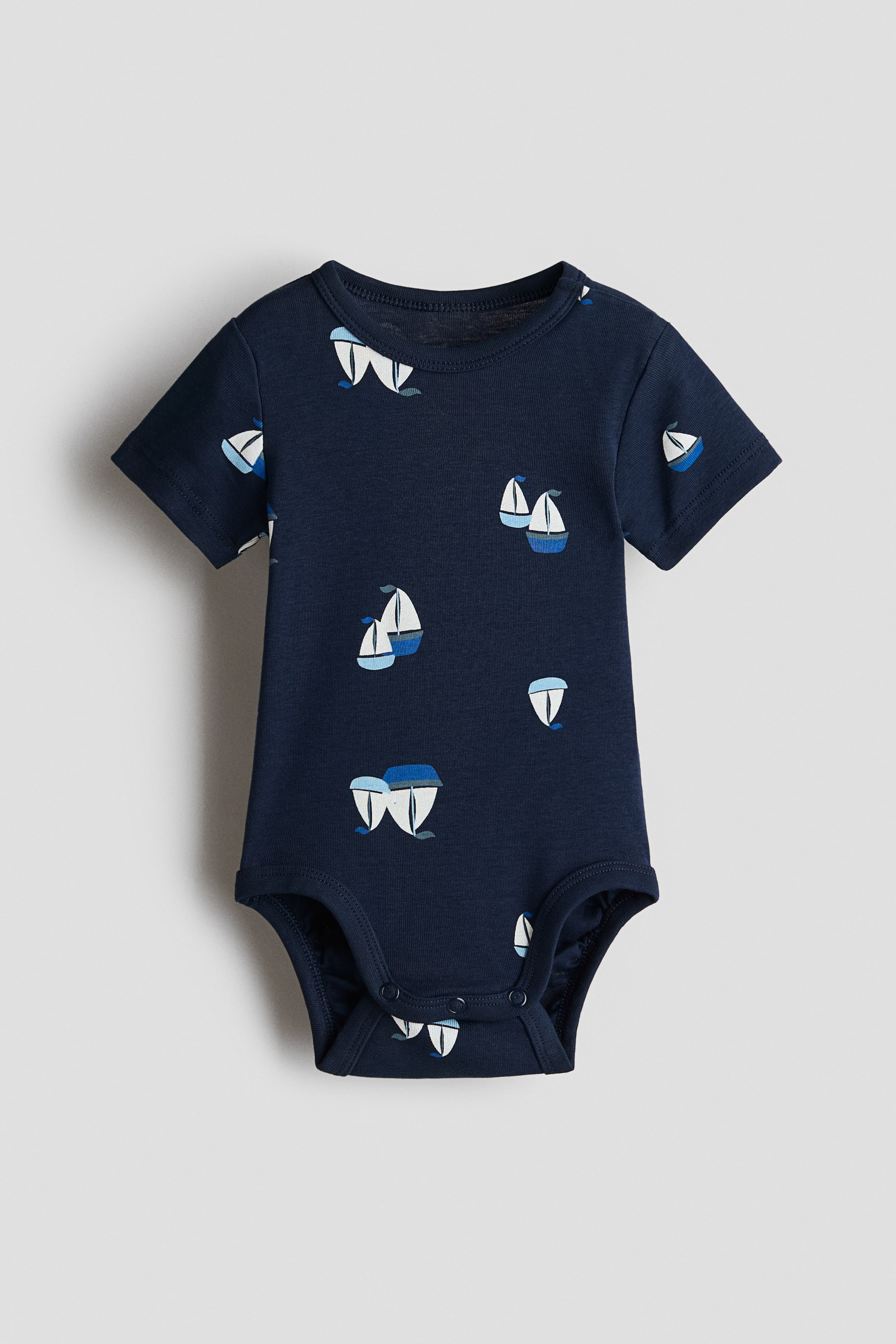 View larger image: Printed bodysuit - Navy blue/Sailboats - Kids | H&M 1