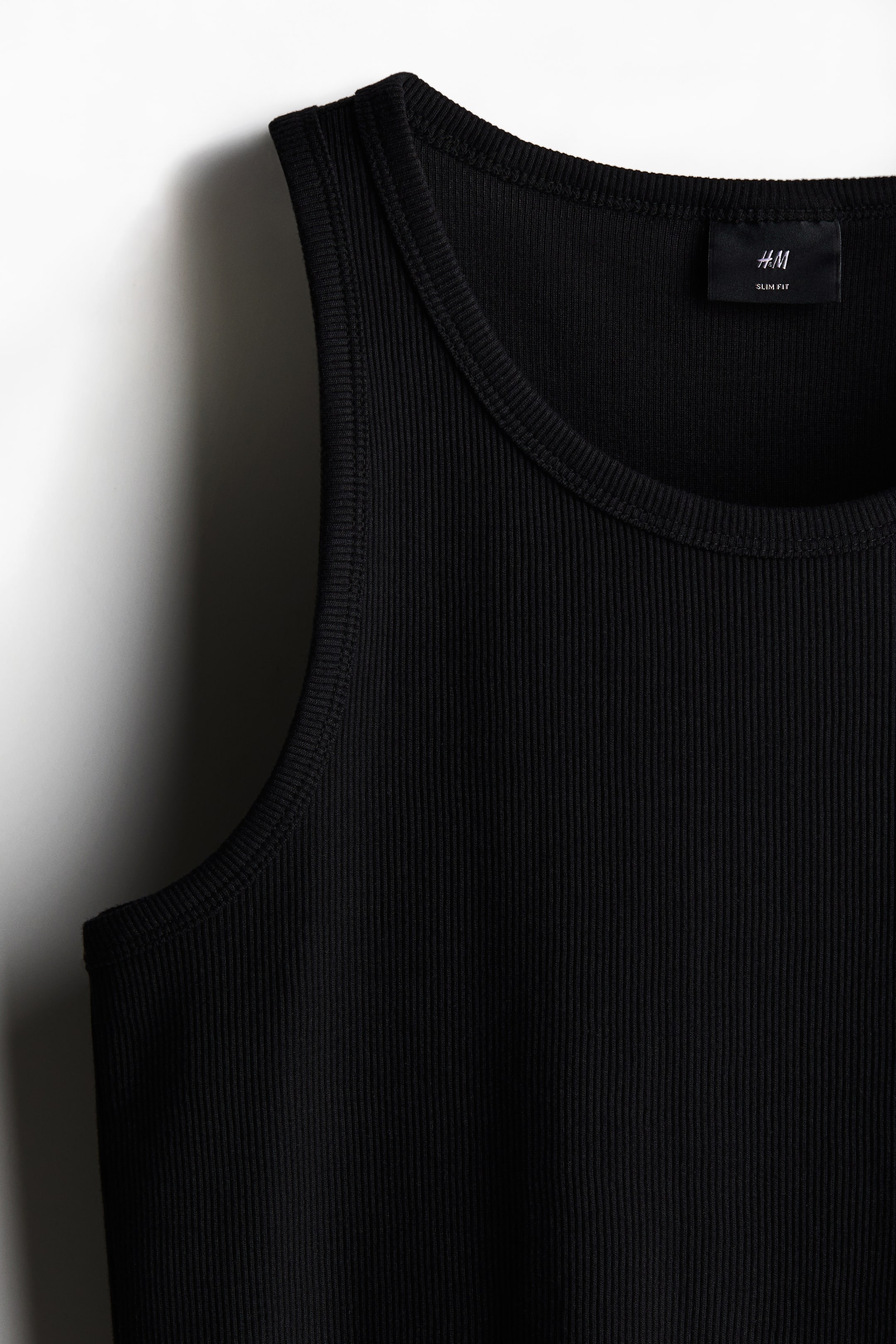 Slim Fit Ribbed vest top - Black - Men | H&M GB 2