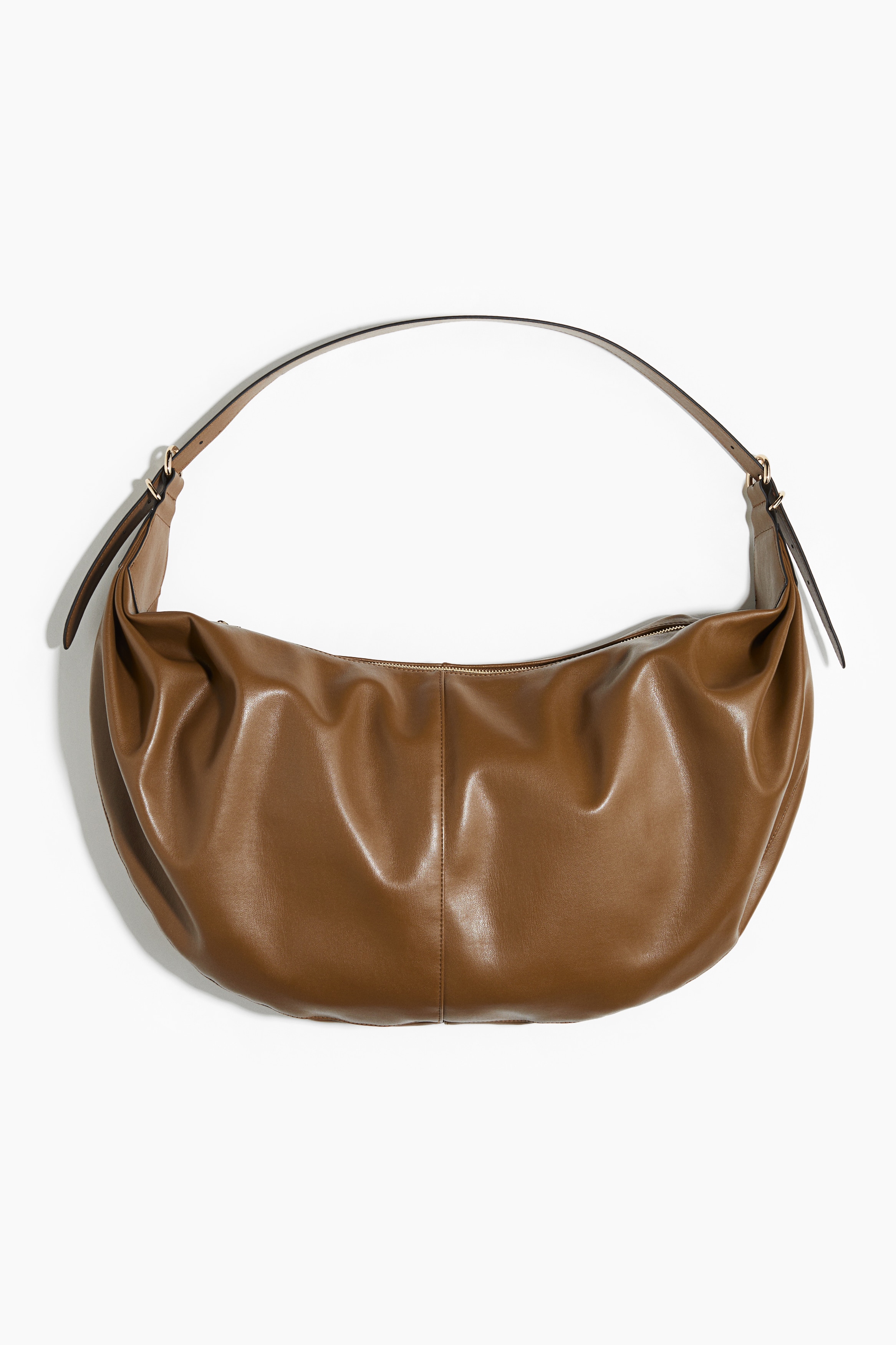 Skuldertaske med rundet form - Brun