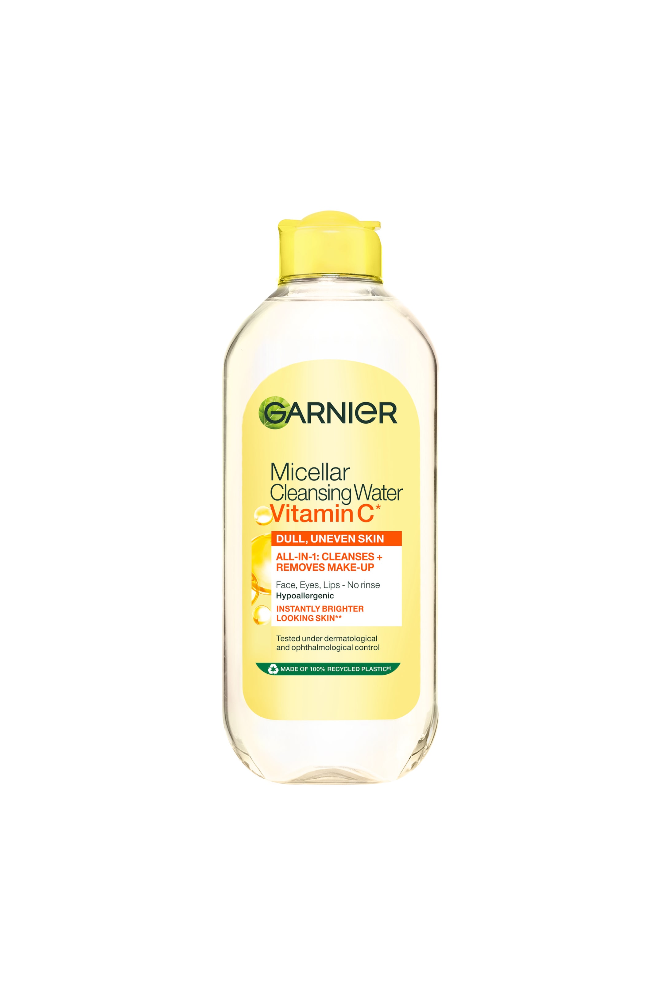 Visa större bild: En flaska Garnier Micellar Cleansing Water Vitamin C står upprätt i en framifrån-vy och har en genomskinlig plastkropp fylld med klar vätska samt ett ljust gult flipplock. Etiketten på framsidan visar produktnamnet och viktiga detaljer i grön, orange och svart text mot en gul och vit bakgrund.