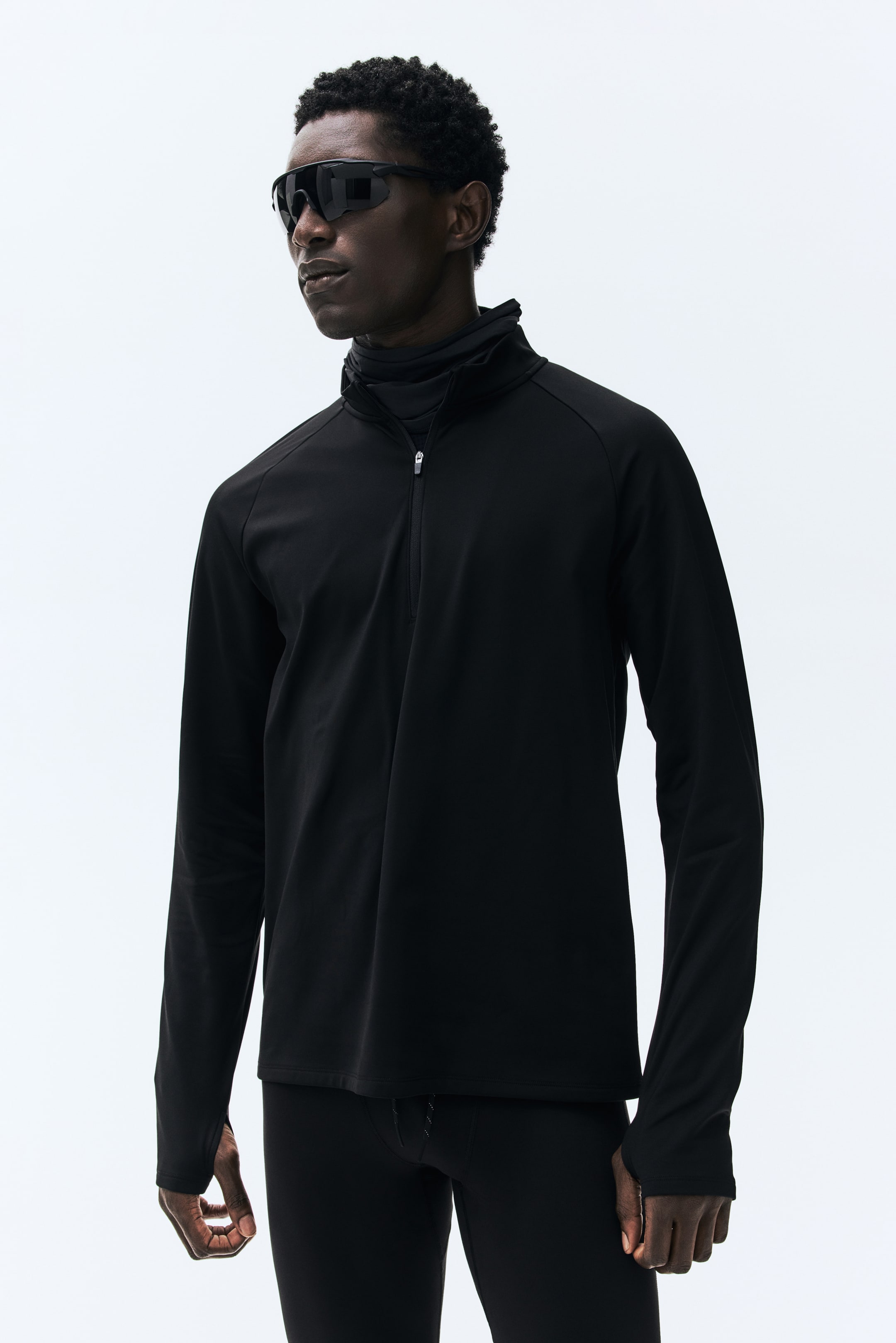 Agrandir l'image: T-shirt de sport midlayer à col zippé ThermoMove™ - Noir - HOMME | H&M CH 1