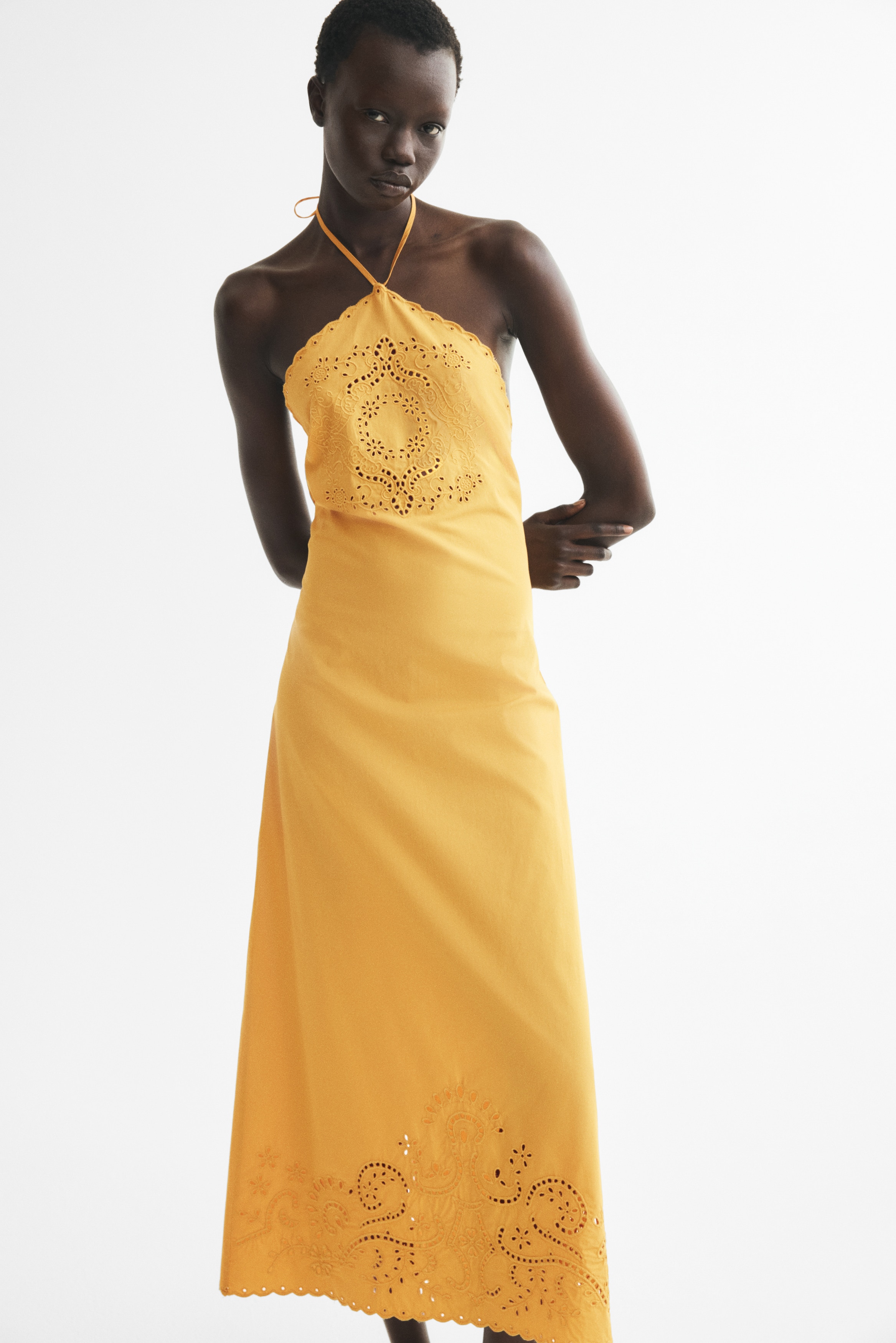Broderie anglaise halterneck dressModel