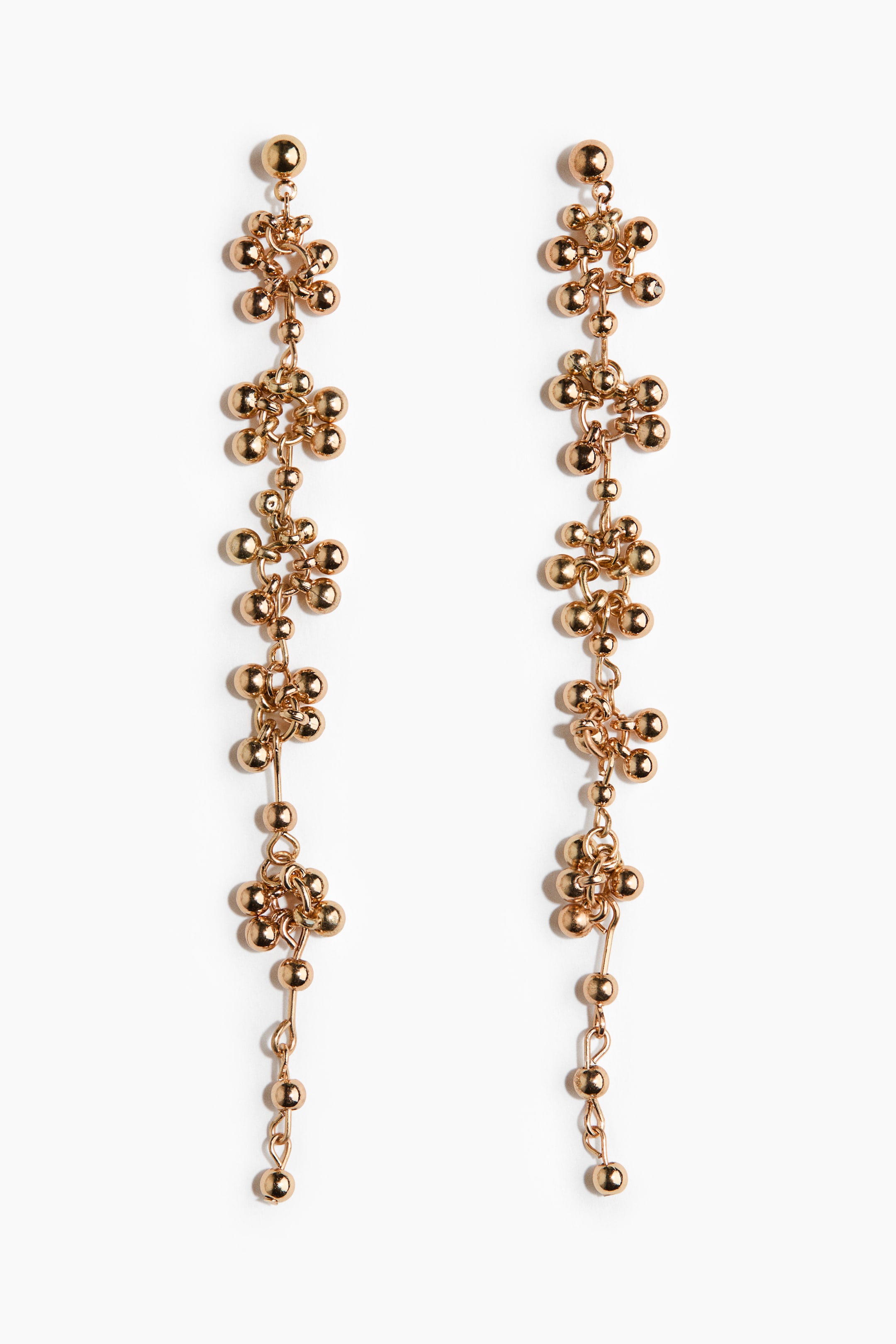 View larger image: A pair of gold-toned drop earrings showcases a sleek linear design, each adorned with multiple interconnected clusters of small, round beads. Topping each earring is a single round stud, from which the bead clusters and individual beads elegantly cascade downwards.