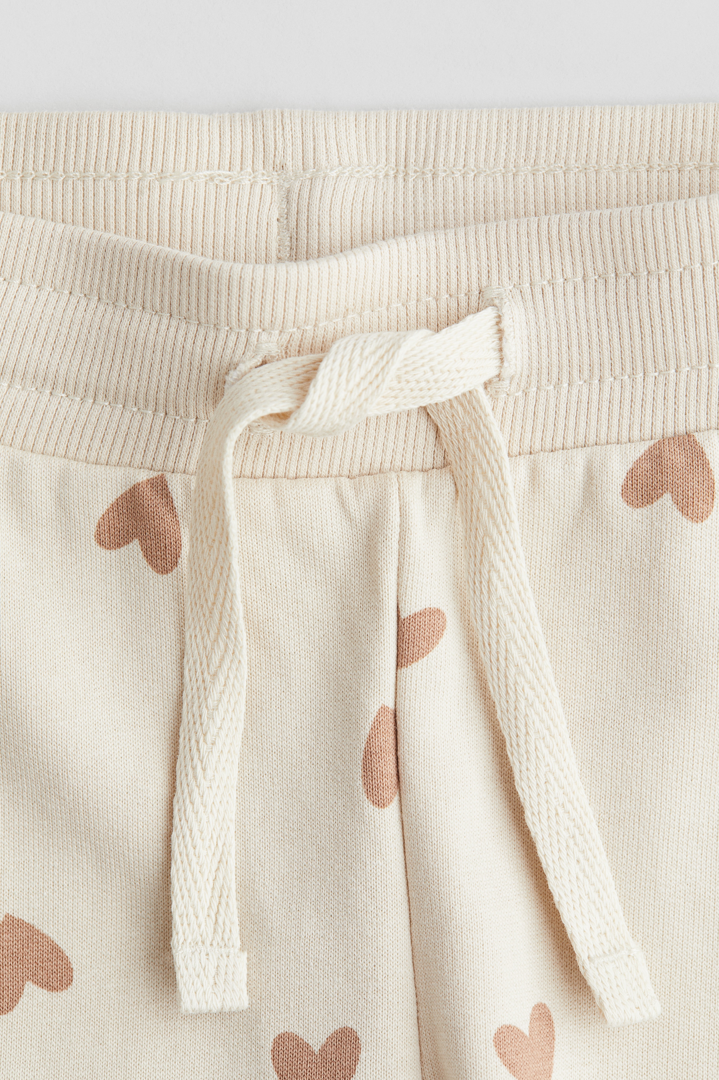 Mary heart pants ベージュ Light beige/hearts Cotton Sweatpants for kids | H&M US