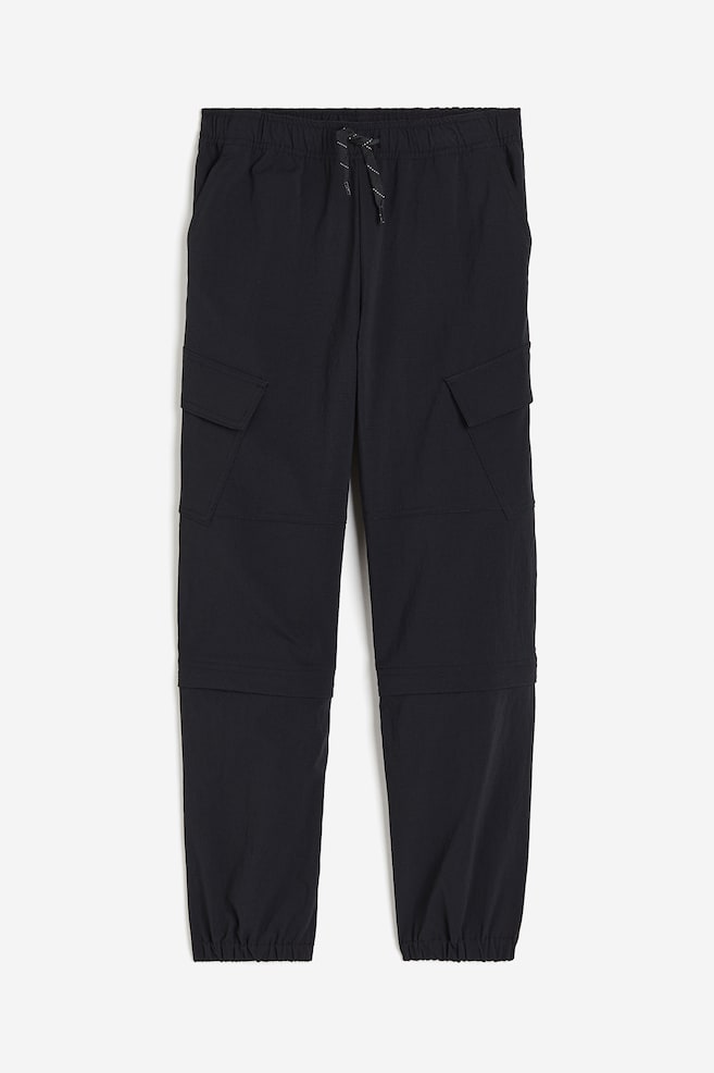 Water-repellent zip-off trousers - Black - 1