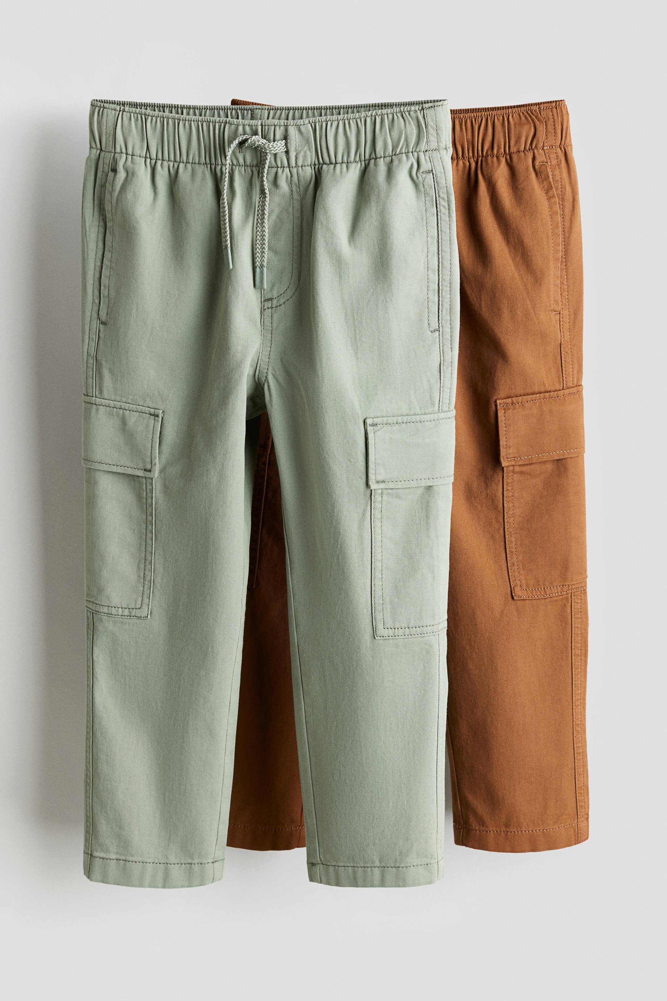 Zobacz większy obraz: Spodnie cargo z diagonalu 2-pak - Zieleń khaki/Brązowy - Dziecko | H&M PL 1