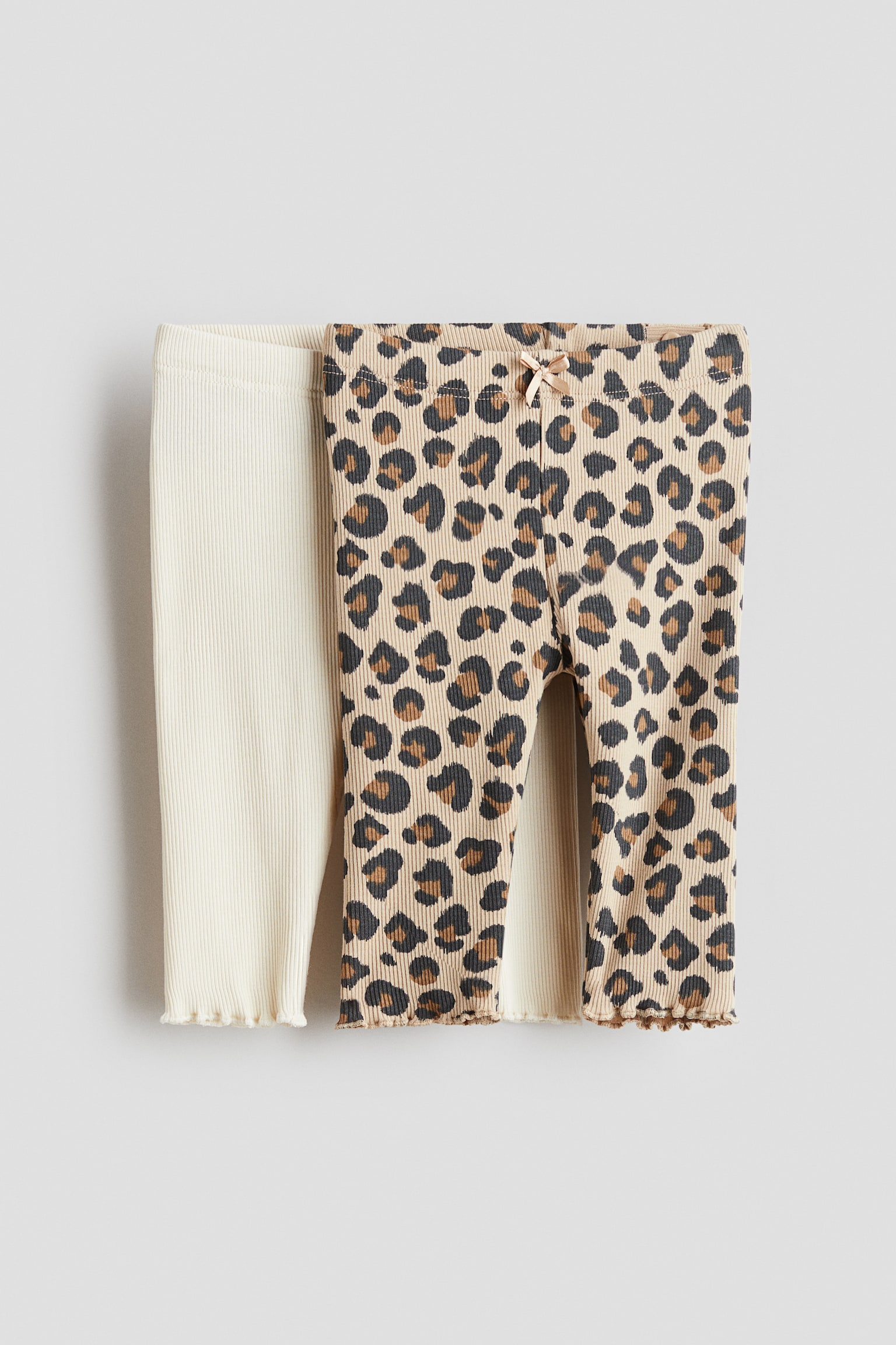 Детские леггинсы H&M 2-pack Ribbed Cotton, цвет: Кремовый / Леопардовый с принтом — фото 1